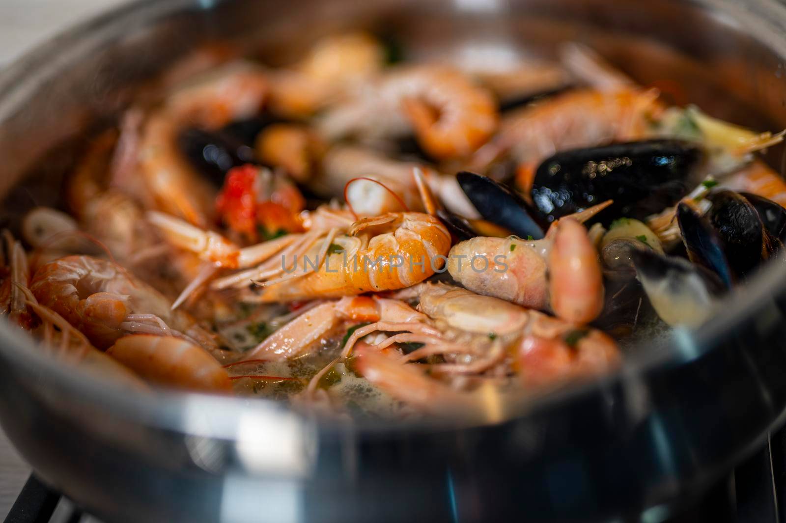 detail of fish soup with sauce during cooking