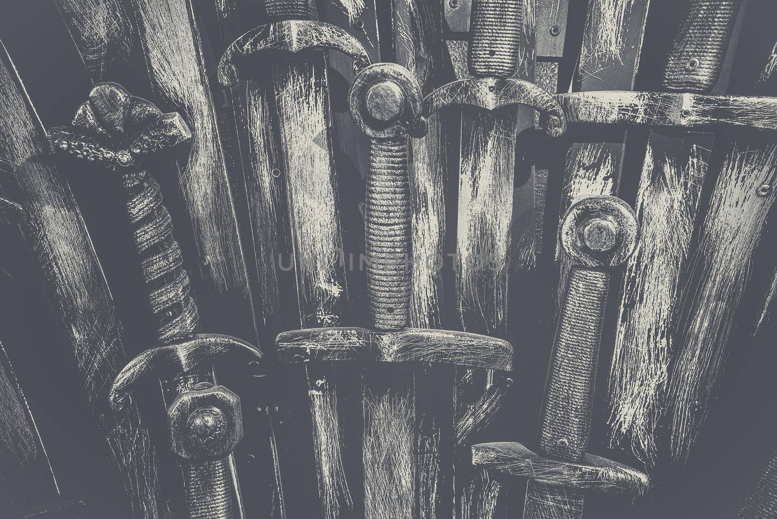 Metal knight swords background. Close up