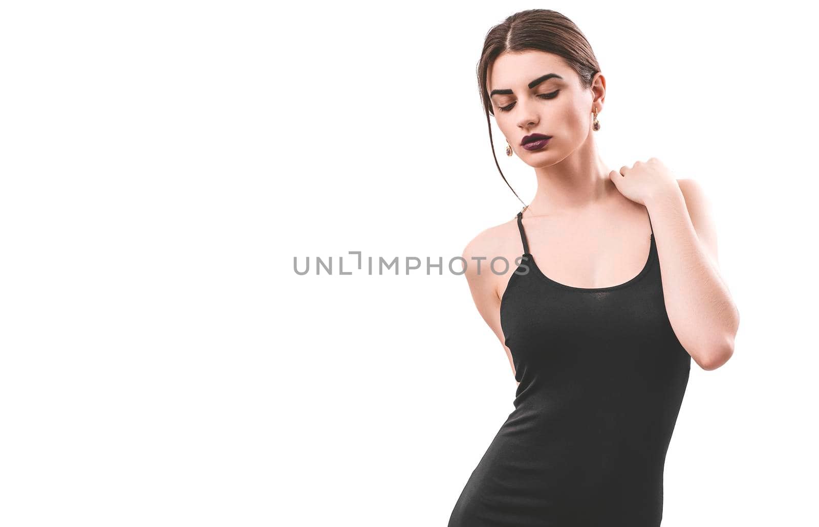 Portrait of nice young gorgeous woman on white backgrounds. To a lots of copy space.