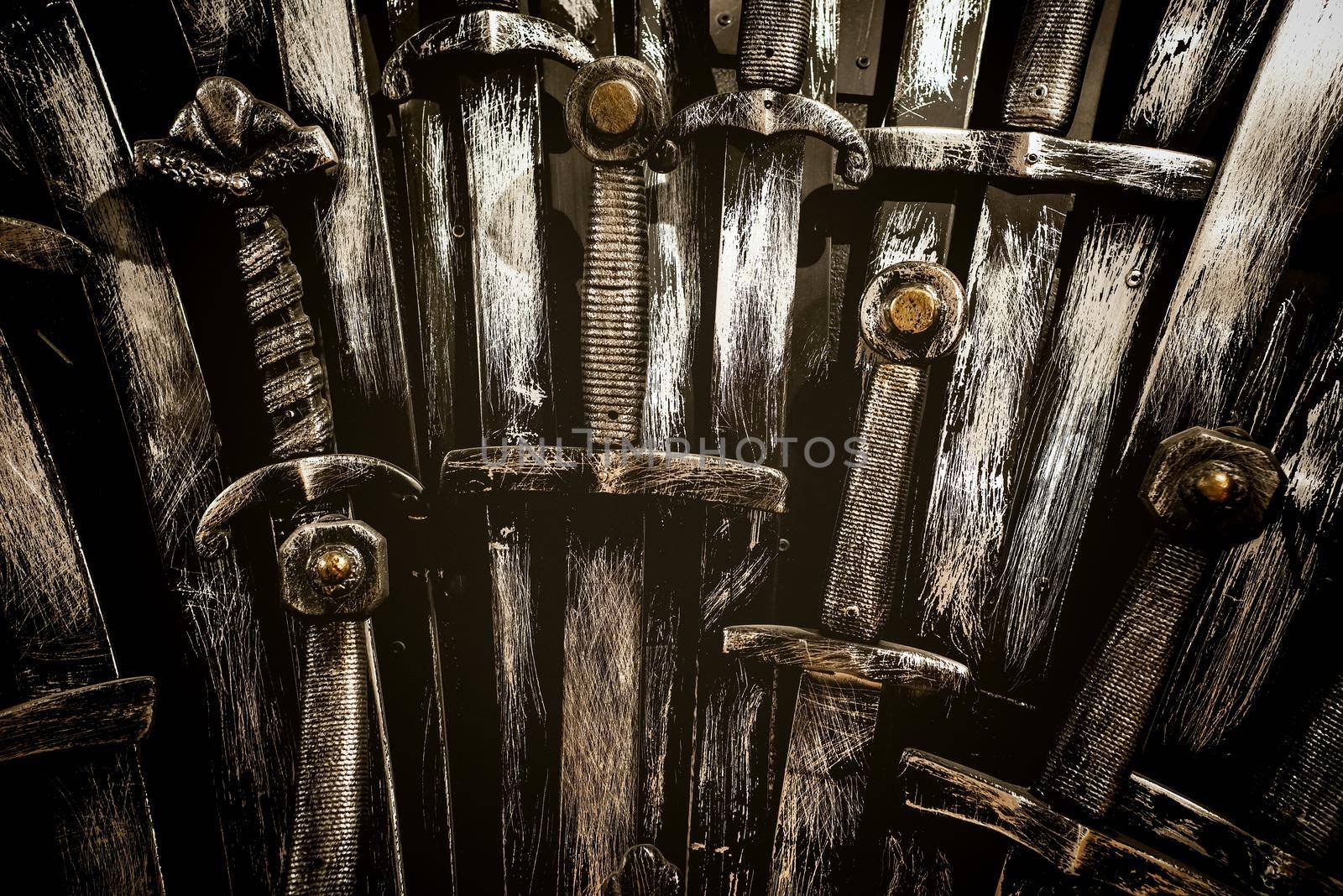 Metal knight swords background. Close up