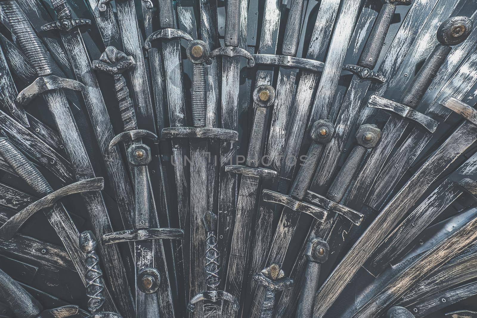 Metal knight swords background. Close up