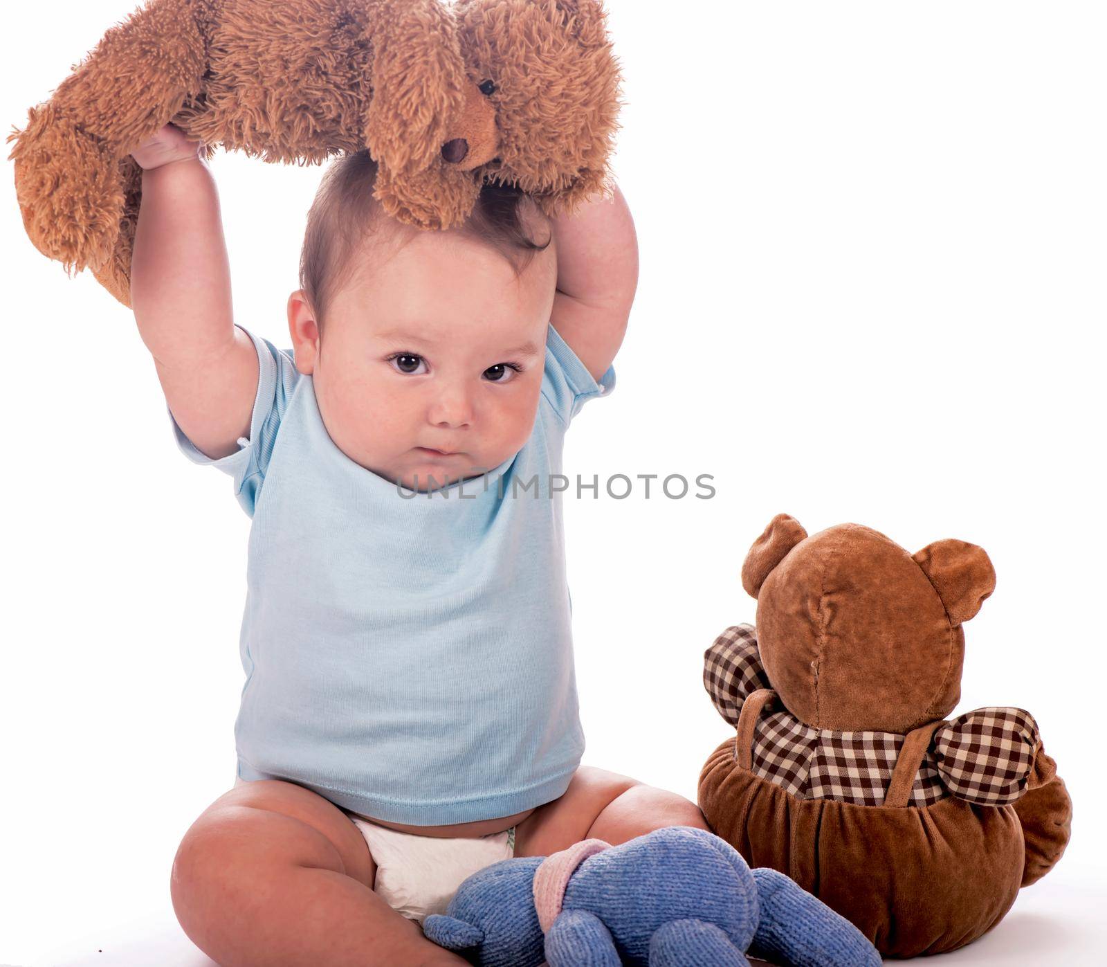 Baby with teddy bears. Sweet child with teddy bears isolated on white by aprilphoto