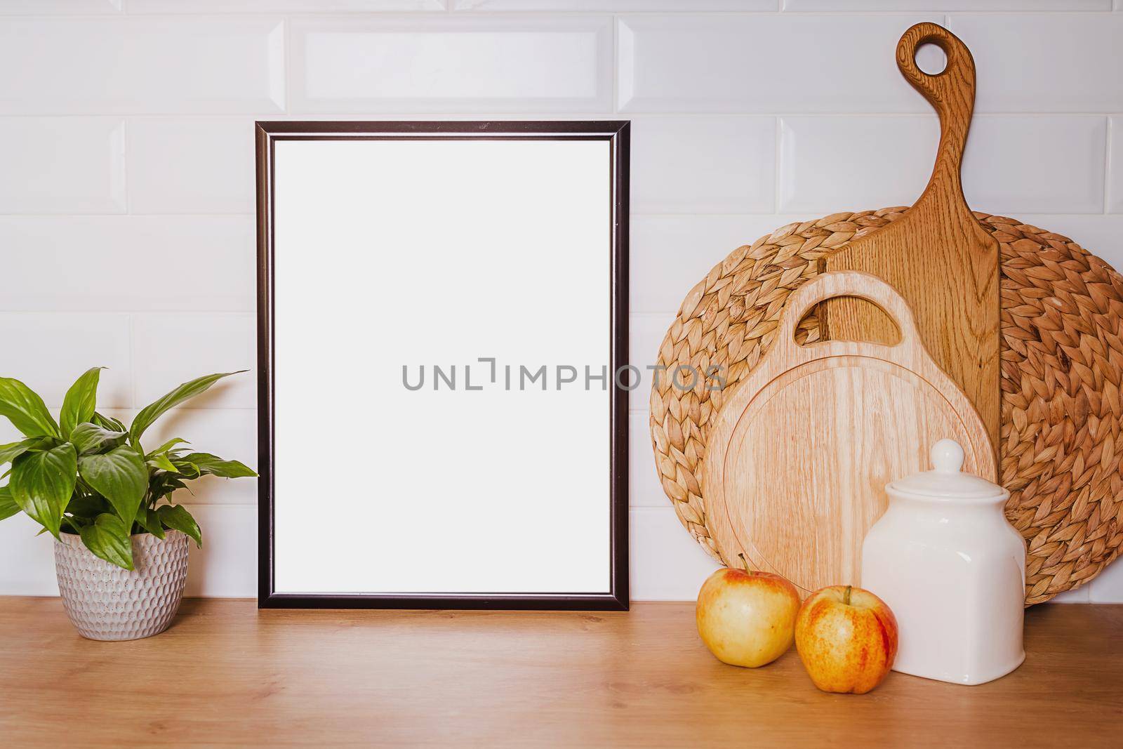 mockup in vintage style. the concept of natural cuisine and healthy food. Black frame with white sheet of paper, wooden boards for bread, fruit and ceramic utensils, flowers, copy paste