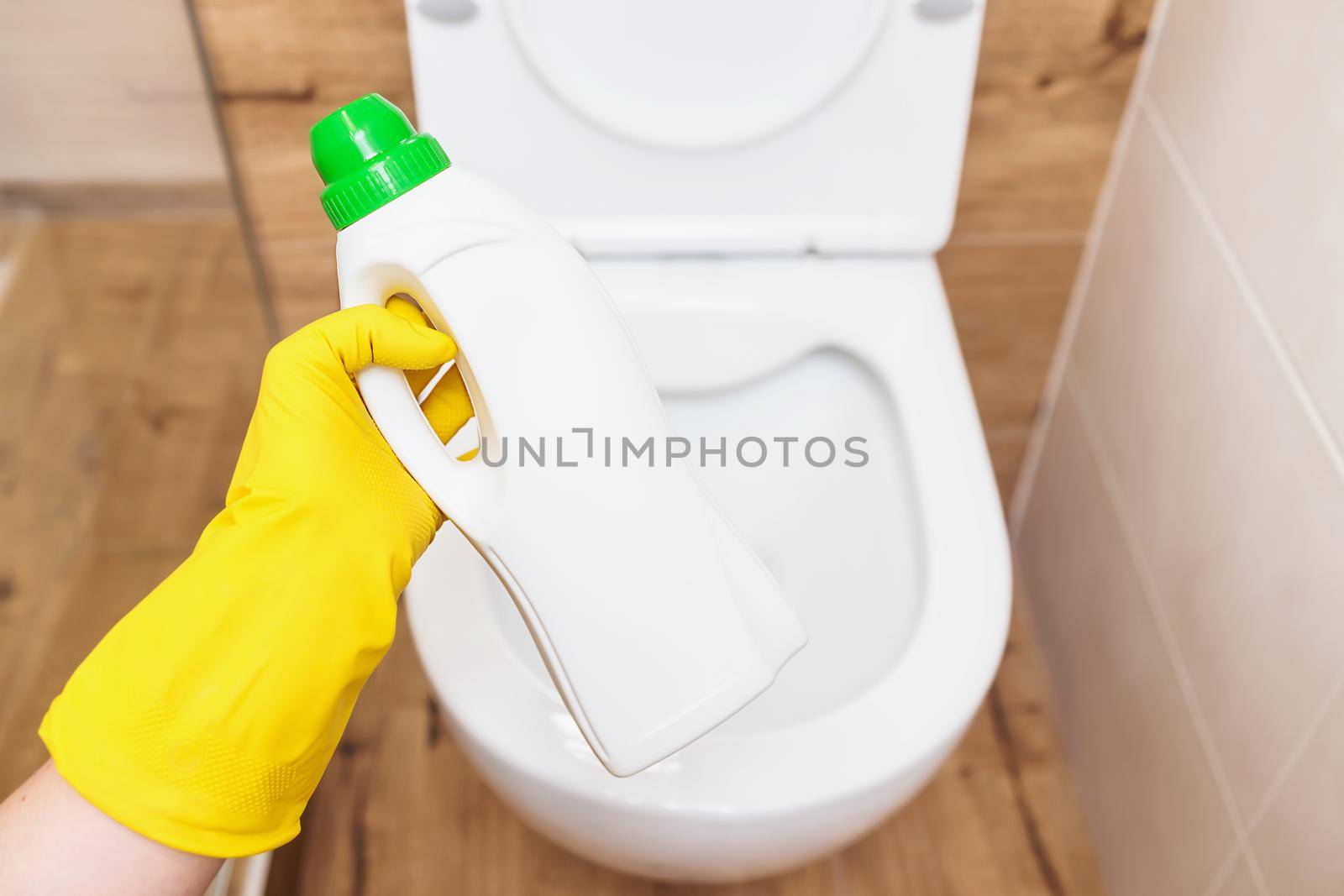 Close-up, disinfectant bottle mockup. Cleaning in the bathroom, toilet by Ramanouskaya