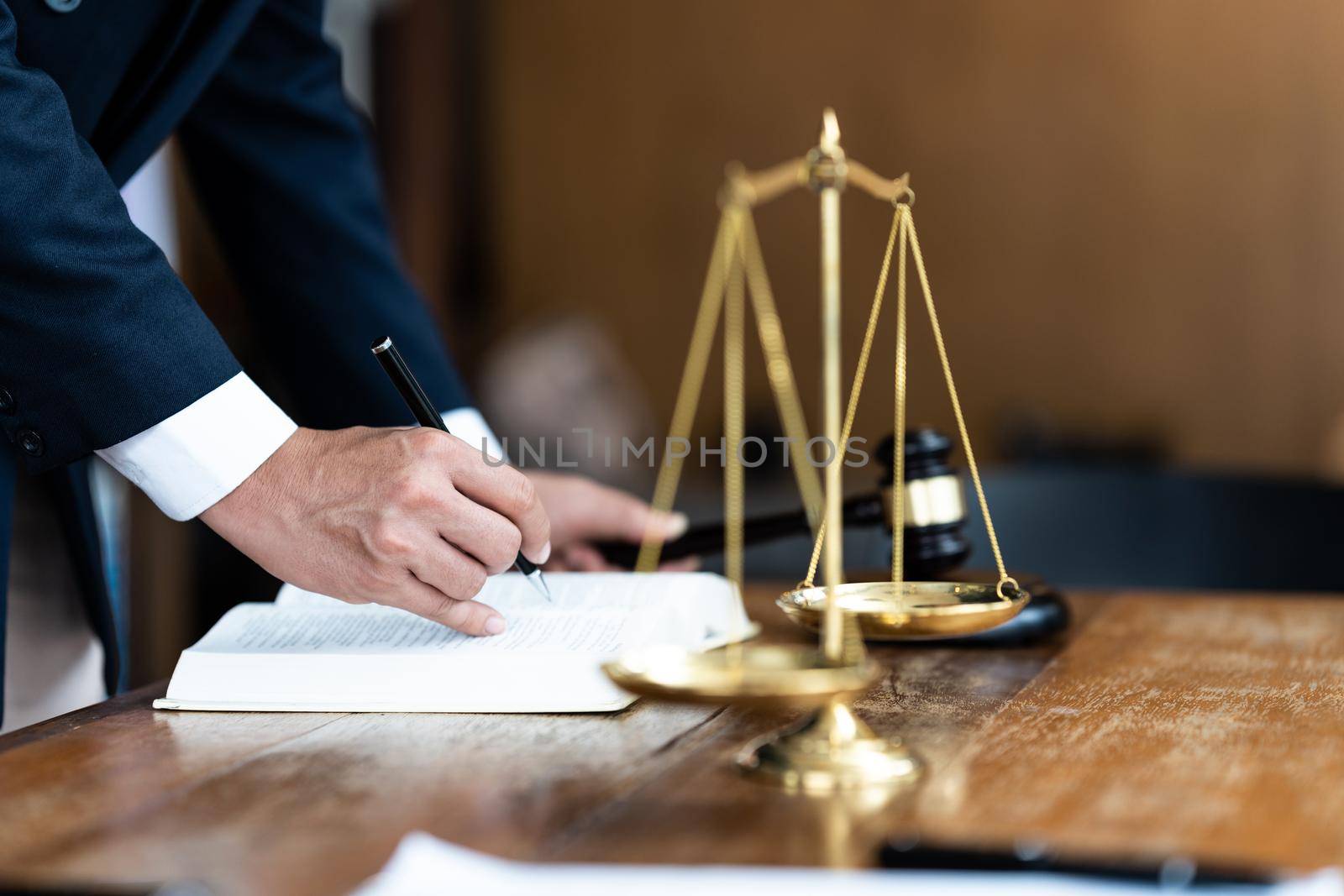 Judge gavel with Justice lawyers having team Concepts of Law and Legal services.
