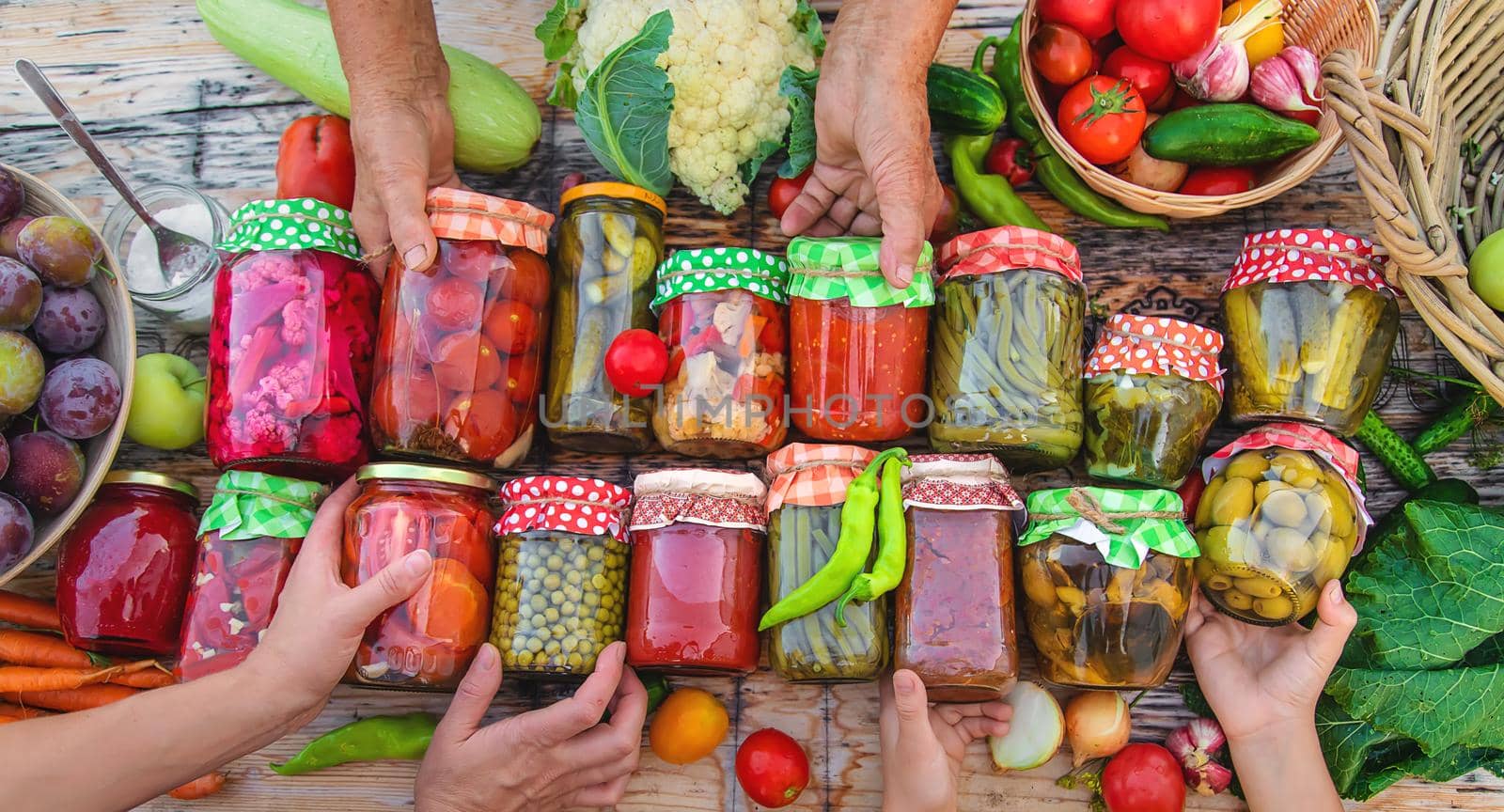 Jars with preserved vegetables for the winter. Selective focus. Food.