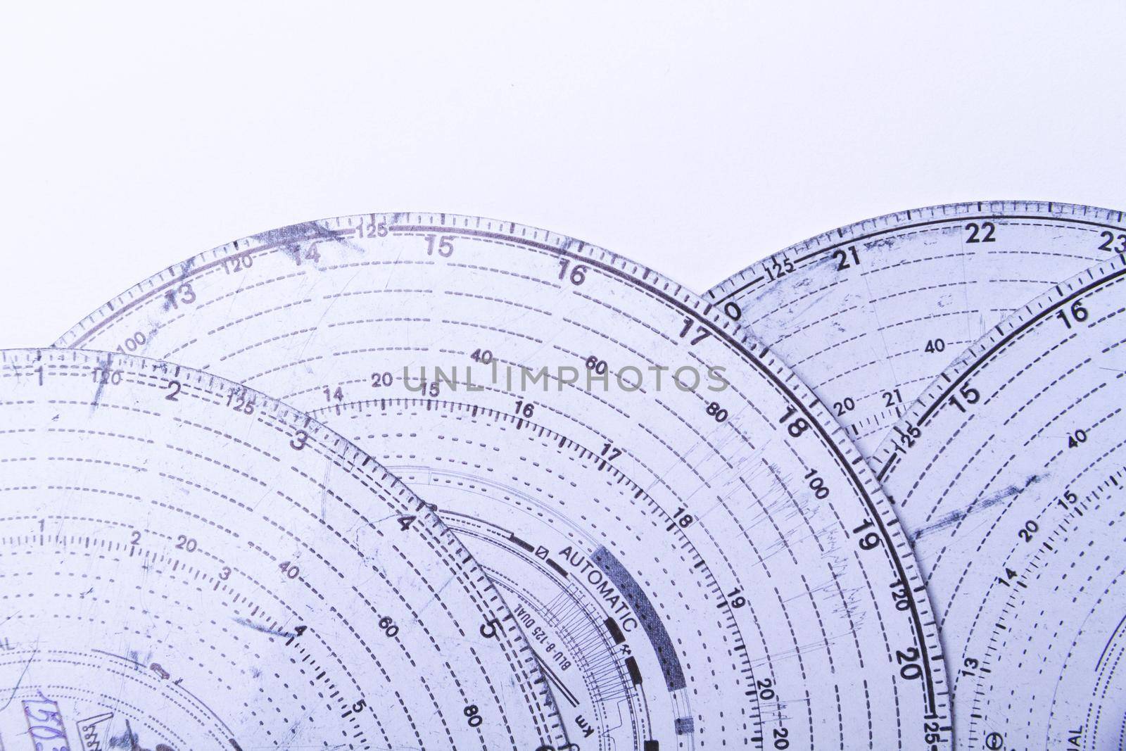 Tachograph. Driver time tracking. Fixing the movement of the car. Cargo transportation with driving according to the schedule. Time disk. Background from recorded analog tachograph disks.