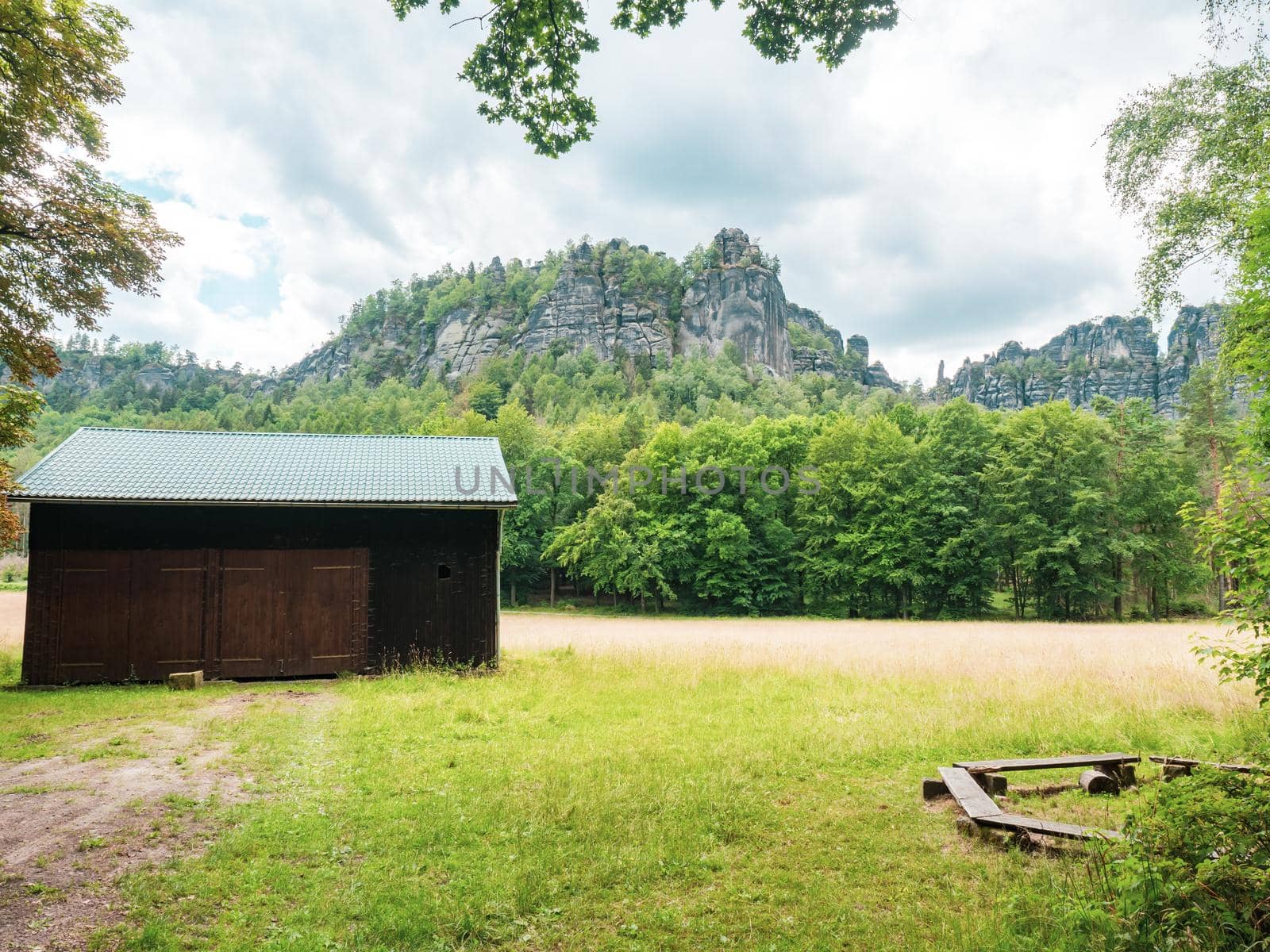 Shelter at meadow close to Schrammsteine and landscape in Saxon Switzerland park on hiking trail Germany