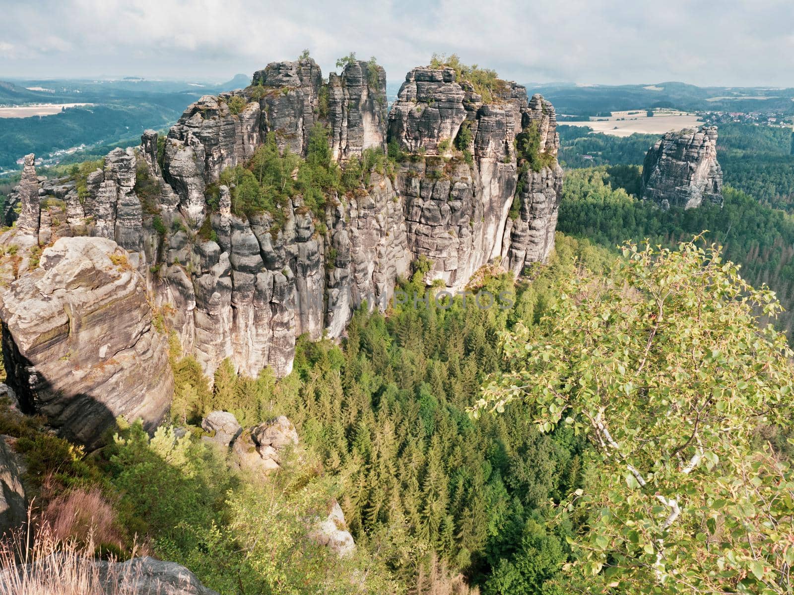 Panoramic view of sharp Schrammsteine and landscape in Saxon by rdonar2