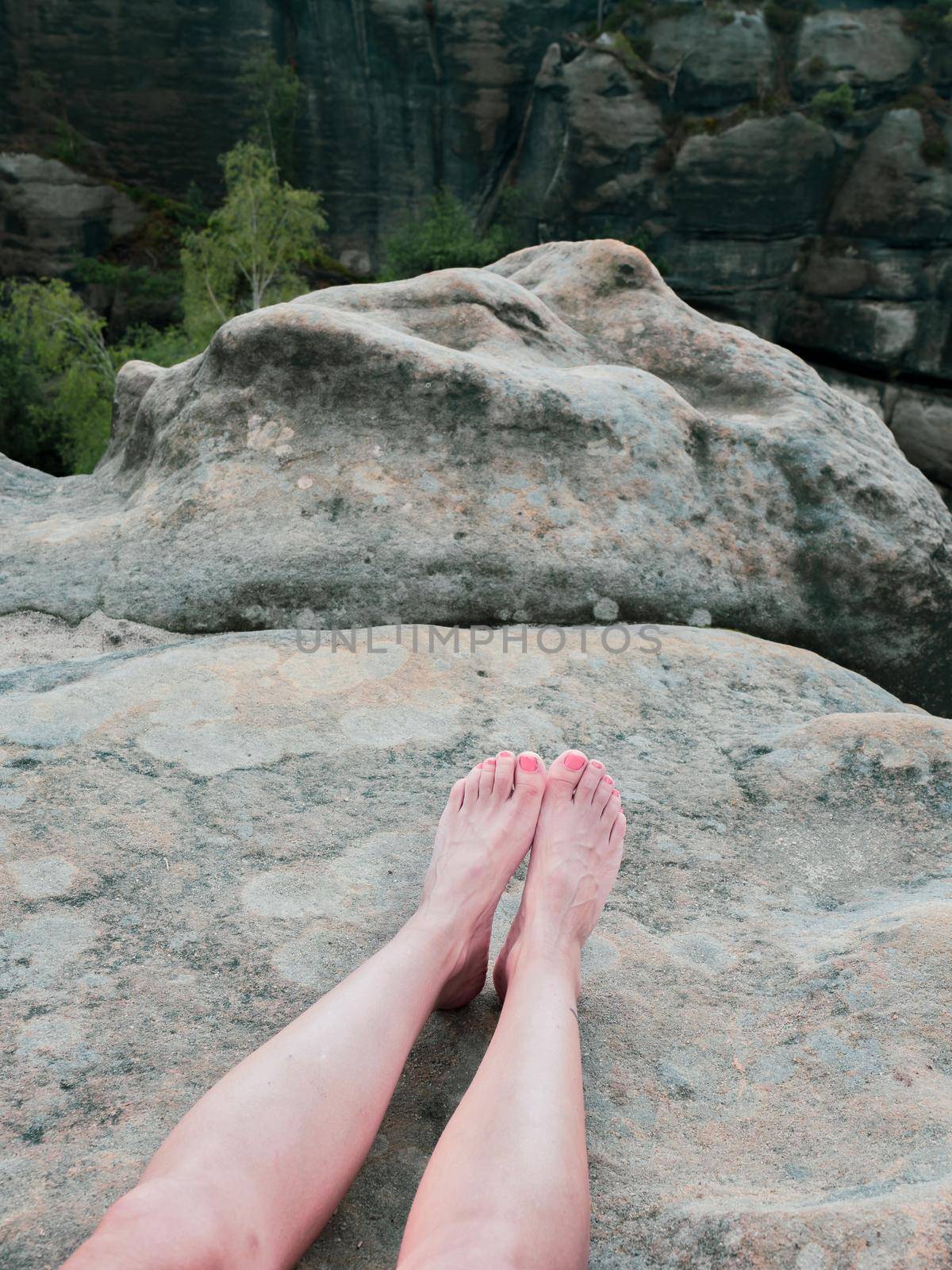 Bare foot with rocky mountain nature background, relax travel concept. And fun