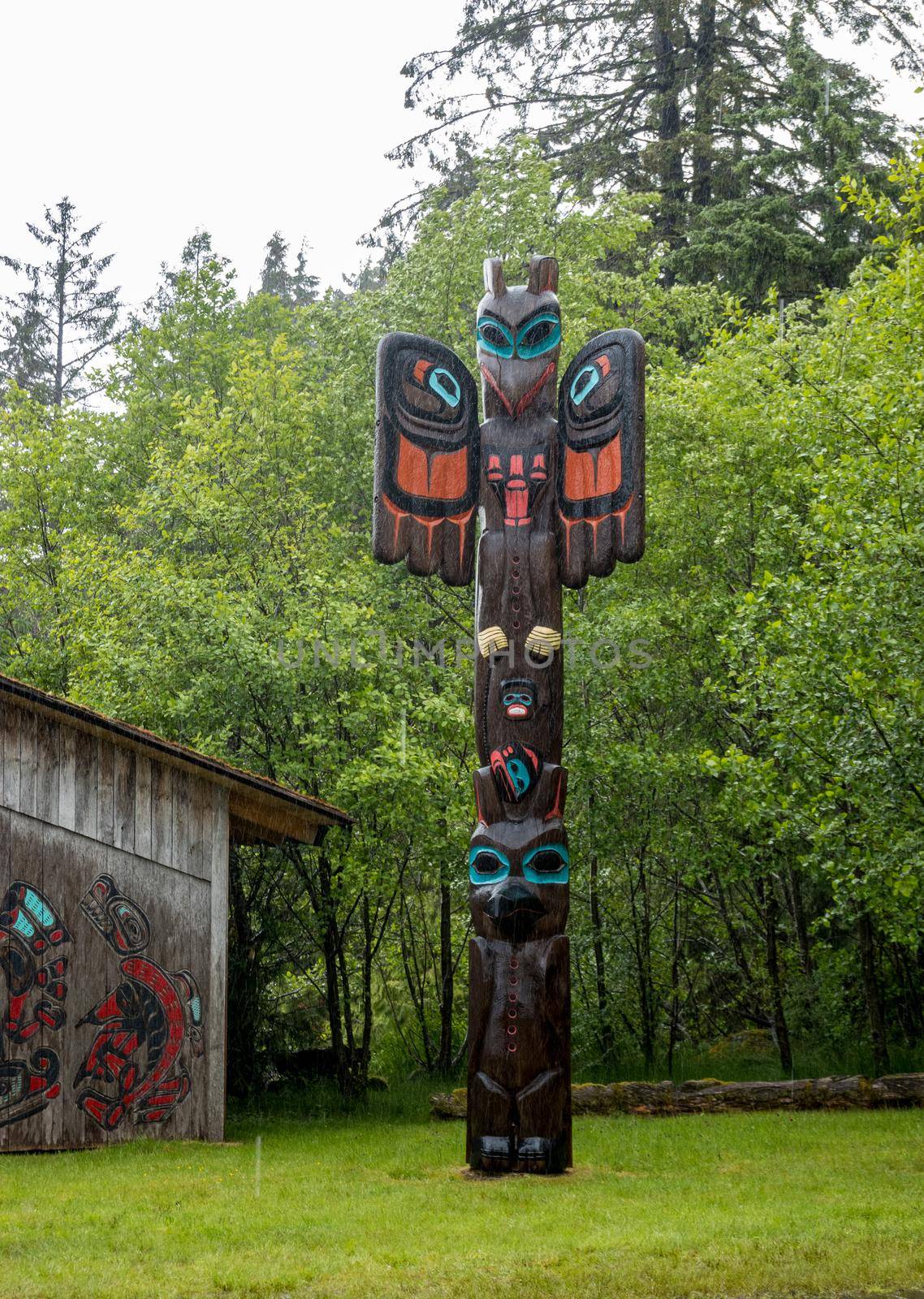 Ketchikan, AK - 10 June 2022: Totem pole in Potlatch Park in Ketchikan Alaska