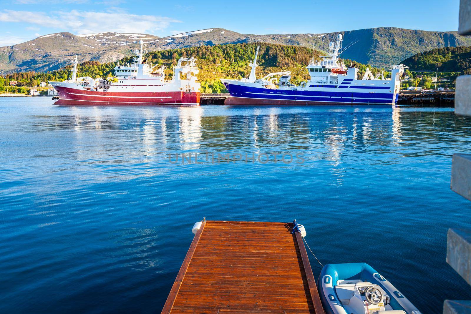 Alesund Sea port harbor with ships at peaceful dawn, Norway, Scandinavia