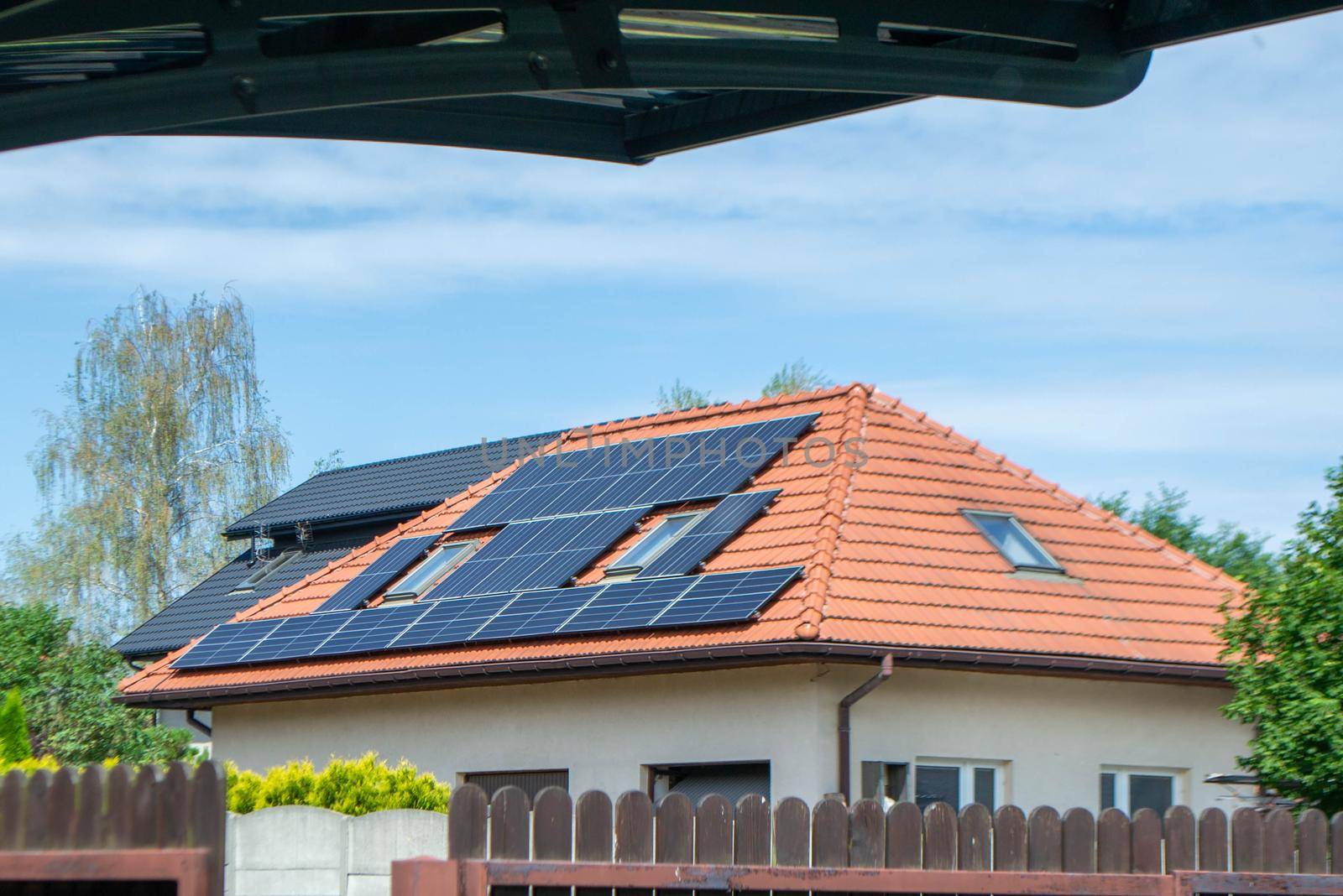 House roof with photovoltaic modules by milastokerpro