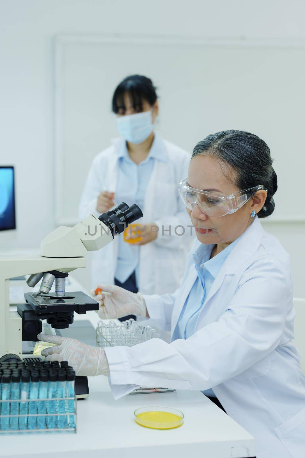 medical research laboratories, scientists analyze chemical samples Discuss technological innovations. Advanced scientific laboratories for medicine, biotechnology