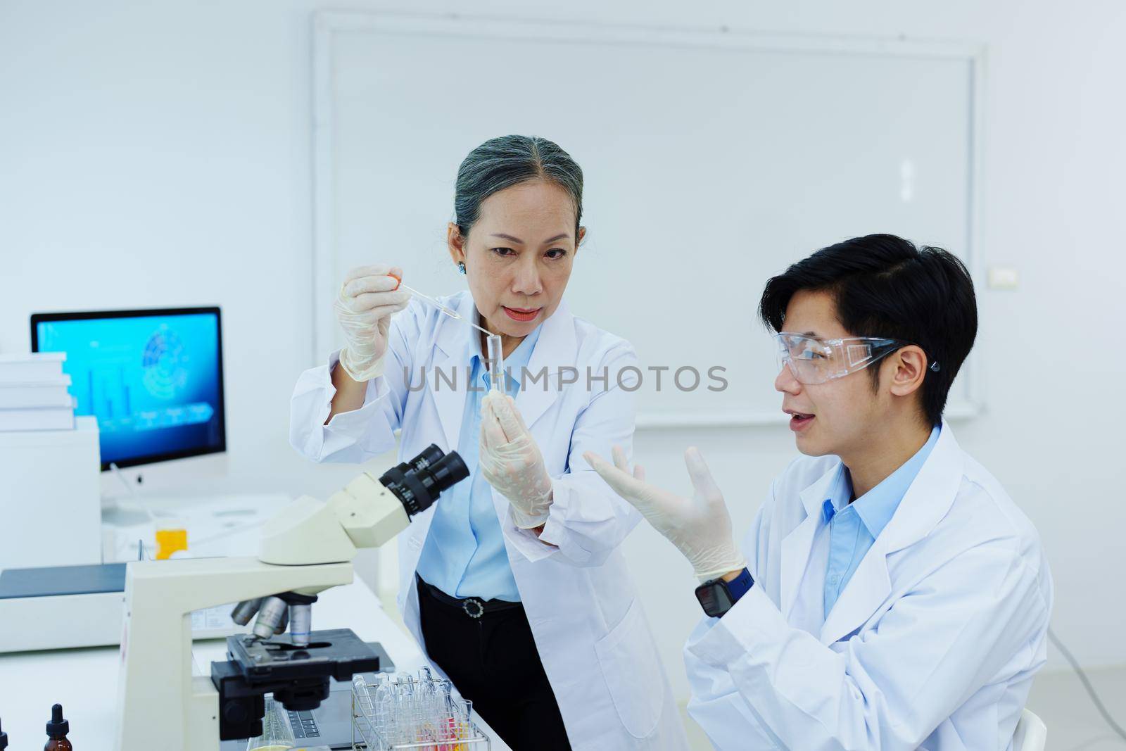 medical research laboratories, scientists analyze chemical samples Discuss technological innovations. Advanced scientific laboratories for medicine, biotechnology