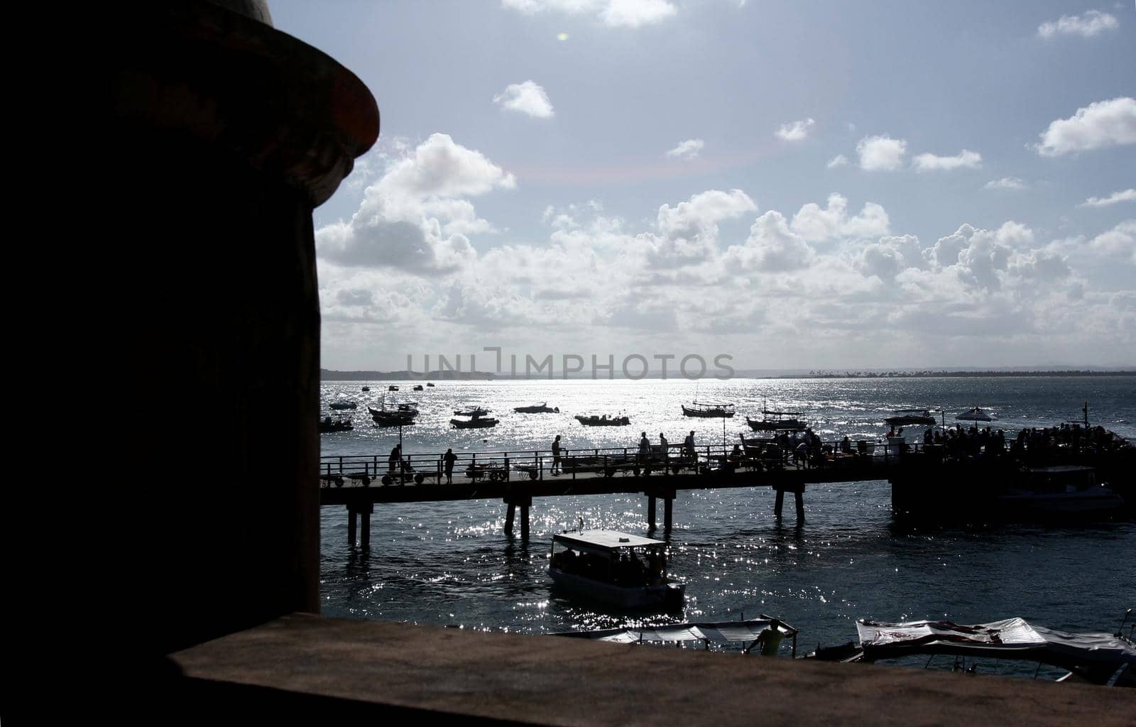 cairu, bahia / brazil - november 14, 2013: tourists are seen during embarkation and disembarkation at the port of the island of Morro de Sao Paulo, in the municipality of Cairu.
