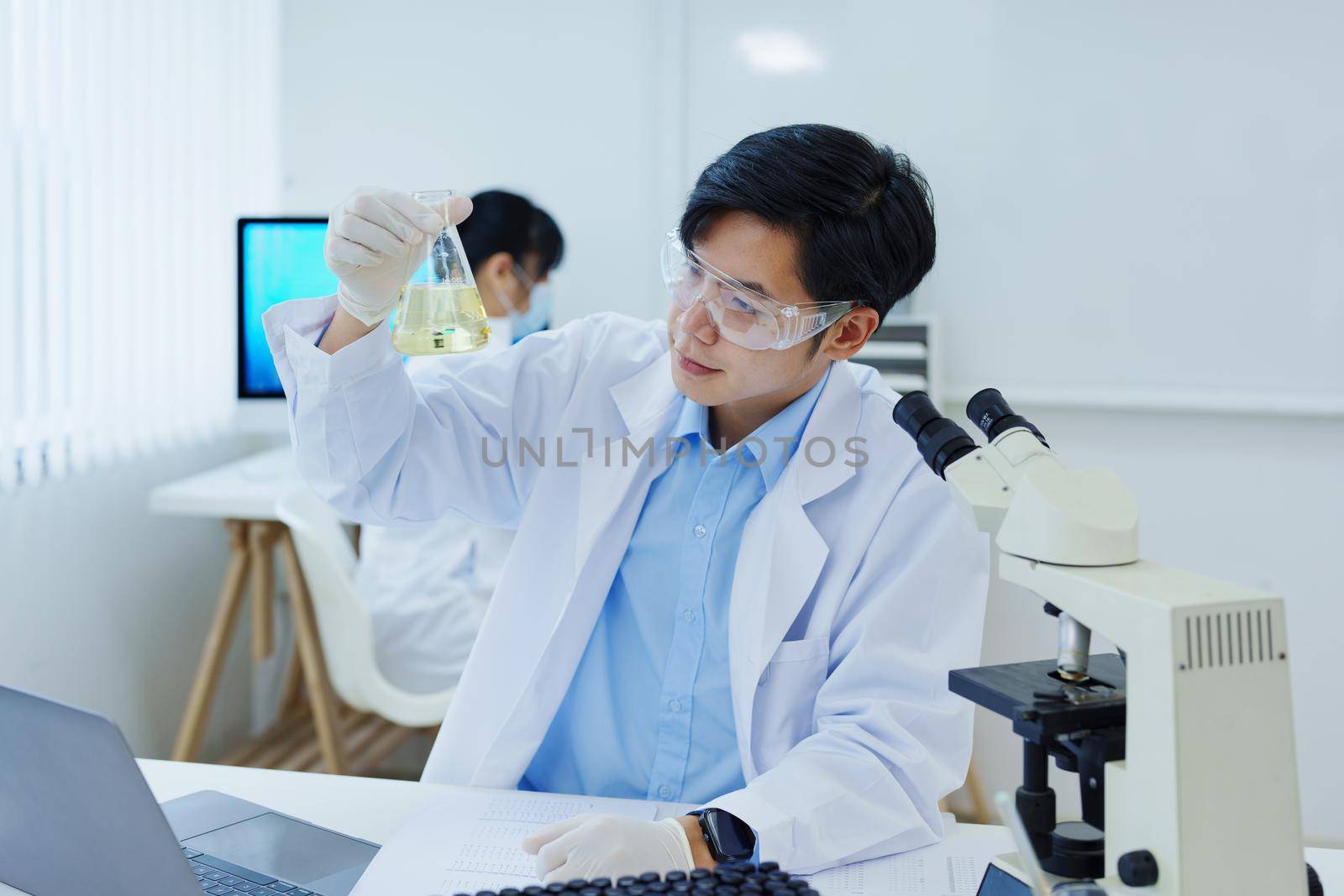 medical research laboratories, scientists analyze chemical samples Discuss technological innovations. Advanced scientific laboratories for medicine, biotechnology