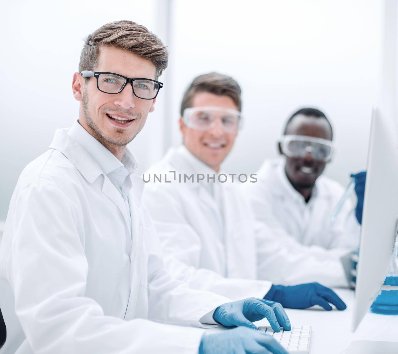 group of young scientists in the laboratory .photo with copy space