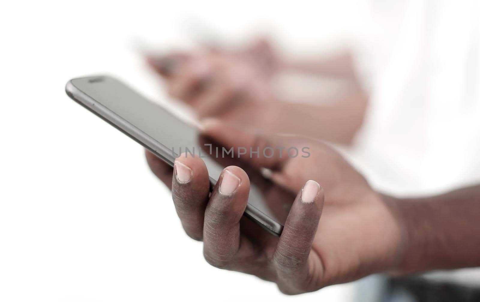 close up. smartphone in the hand of a businessman by asdf