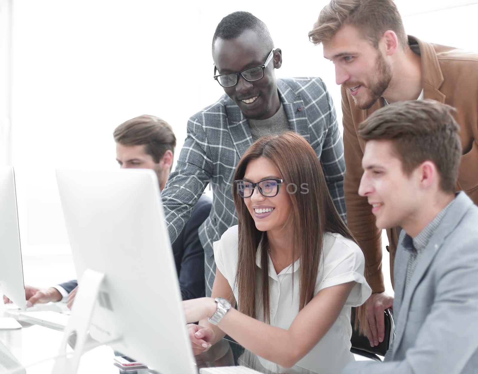 Company employees working in software development and designer office.Full concentration at work