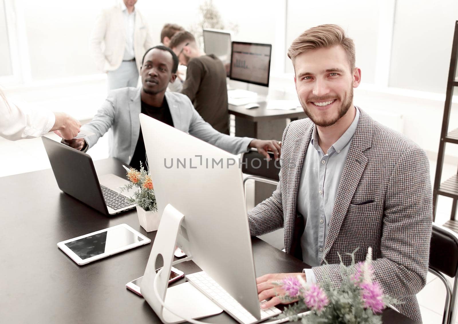 employee sitting at his Desk in the office.business people