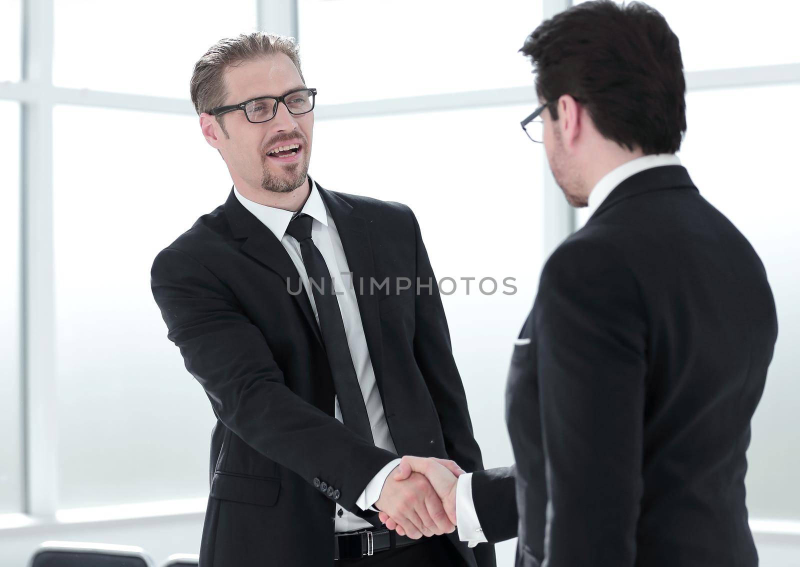 CEO shaking hand to new employee