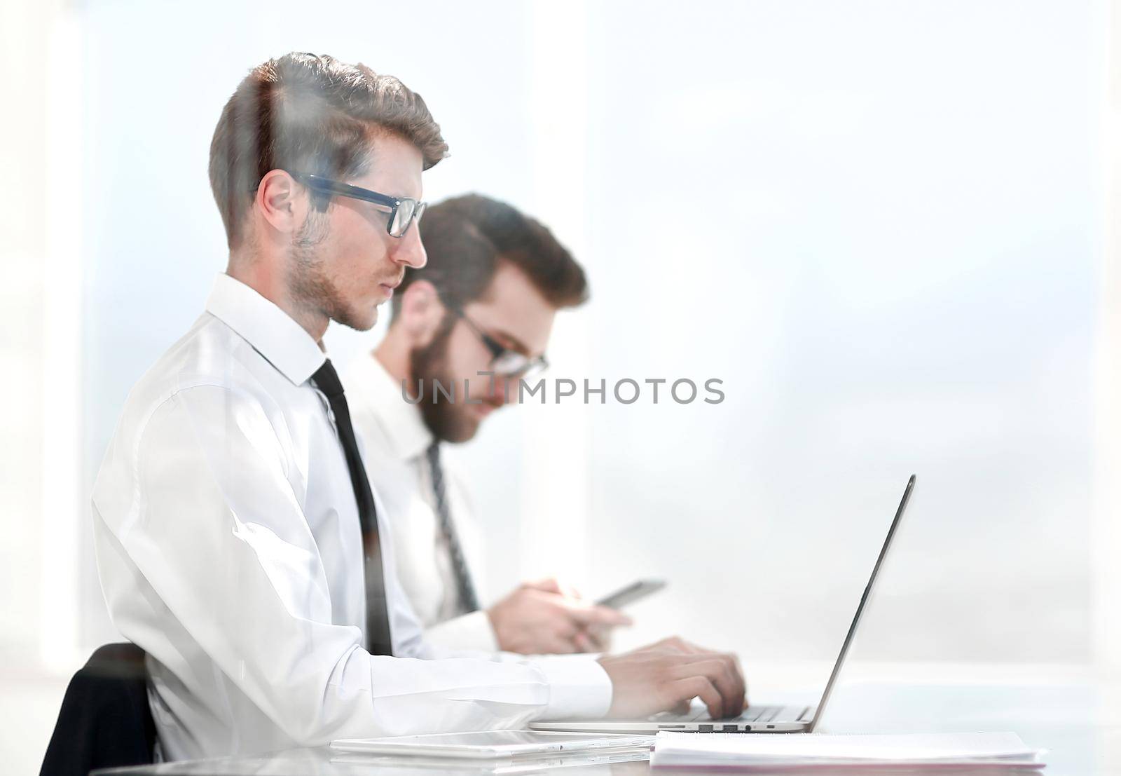 business colleagues work online sitting in the office.photo with copy space