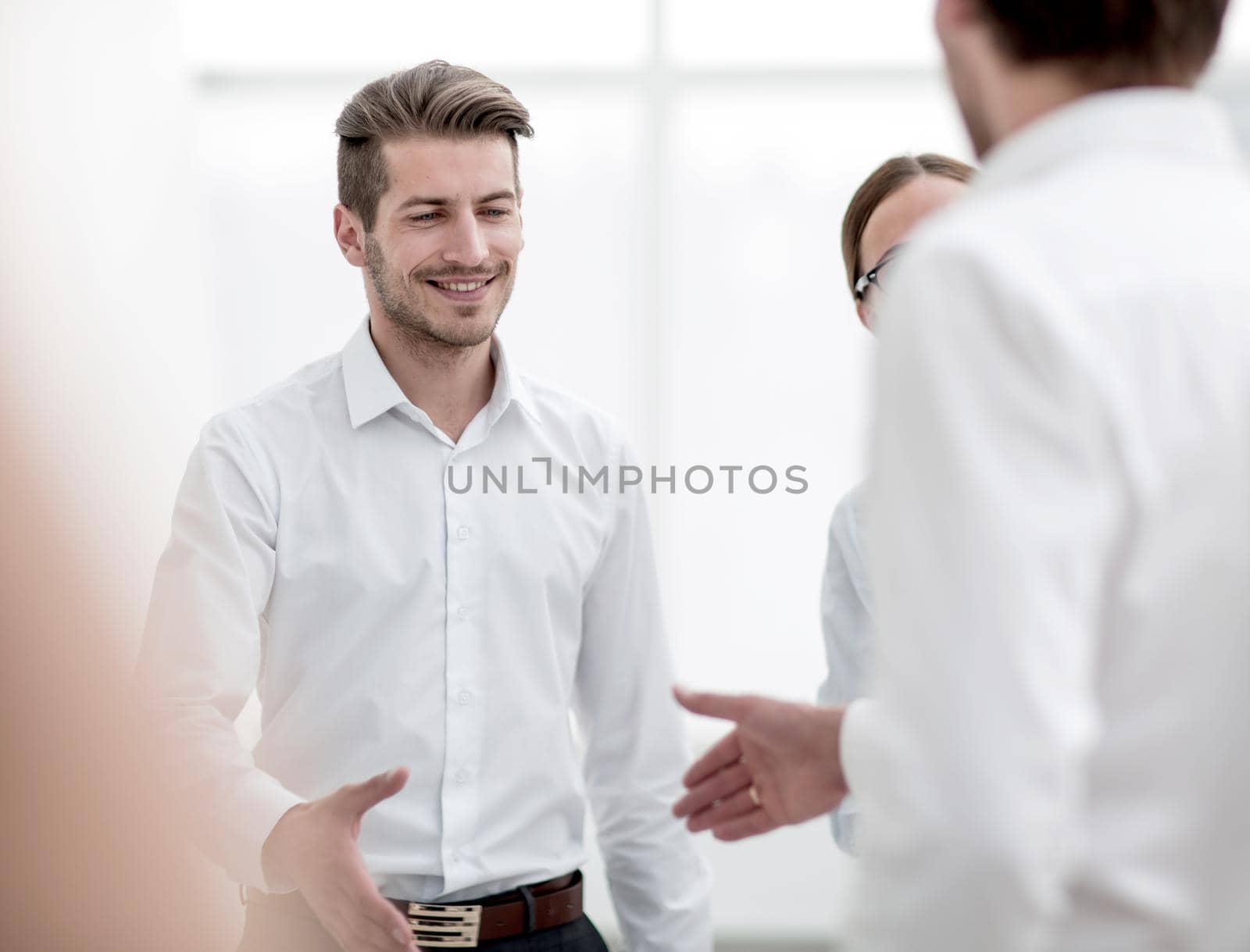 business partners reaching out for a handshake.the concept of cooperation