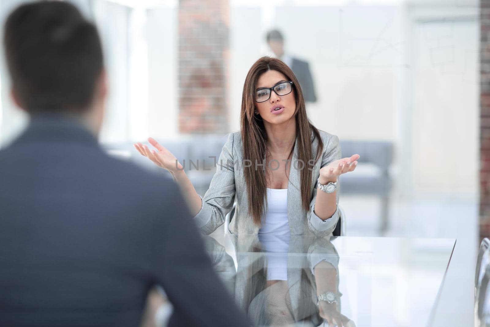business woman explaining to the client the terms of the contract.business concept
