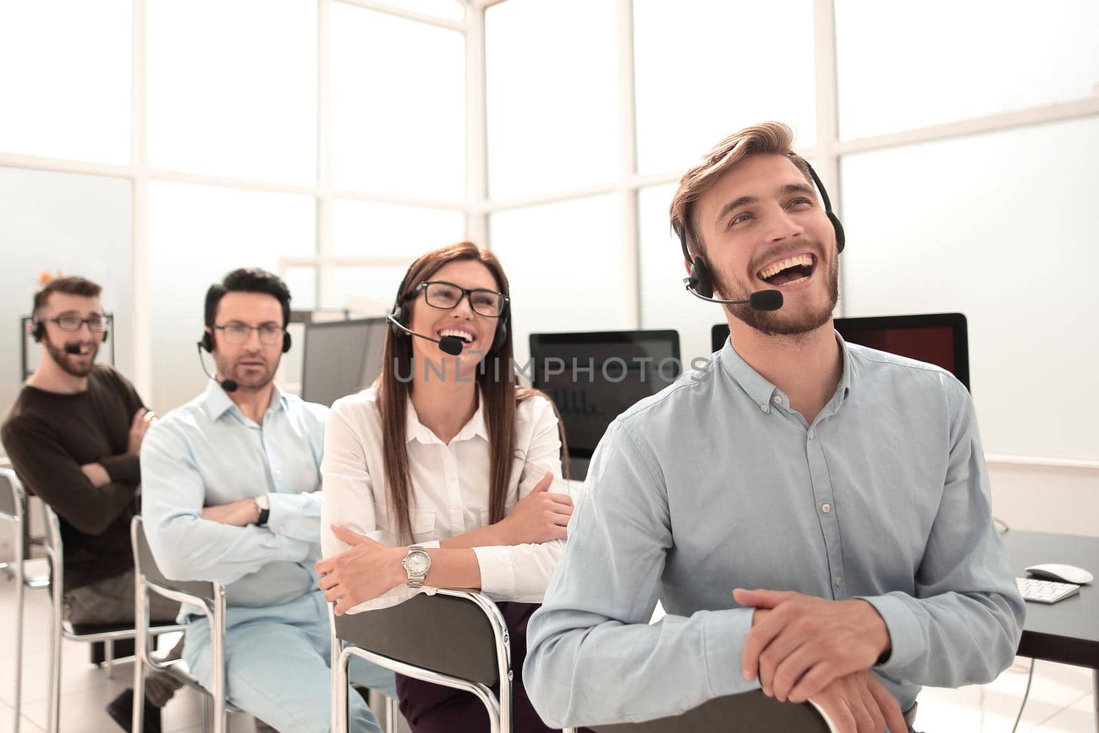 smiling operators support in the workplace. photo with copy space