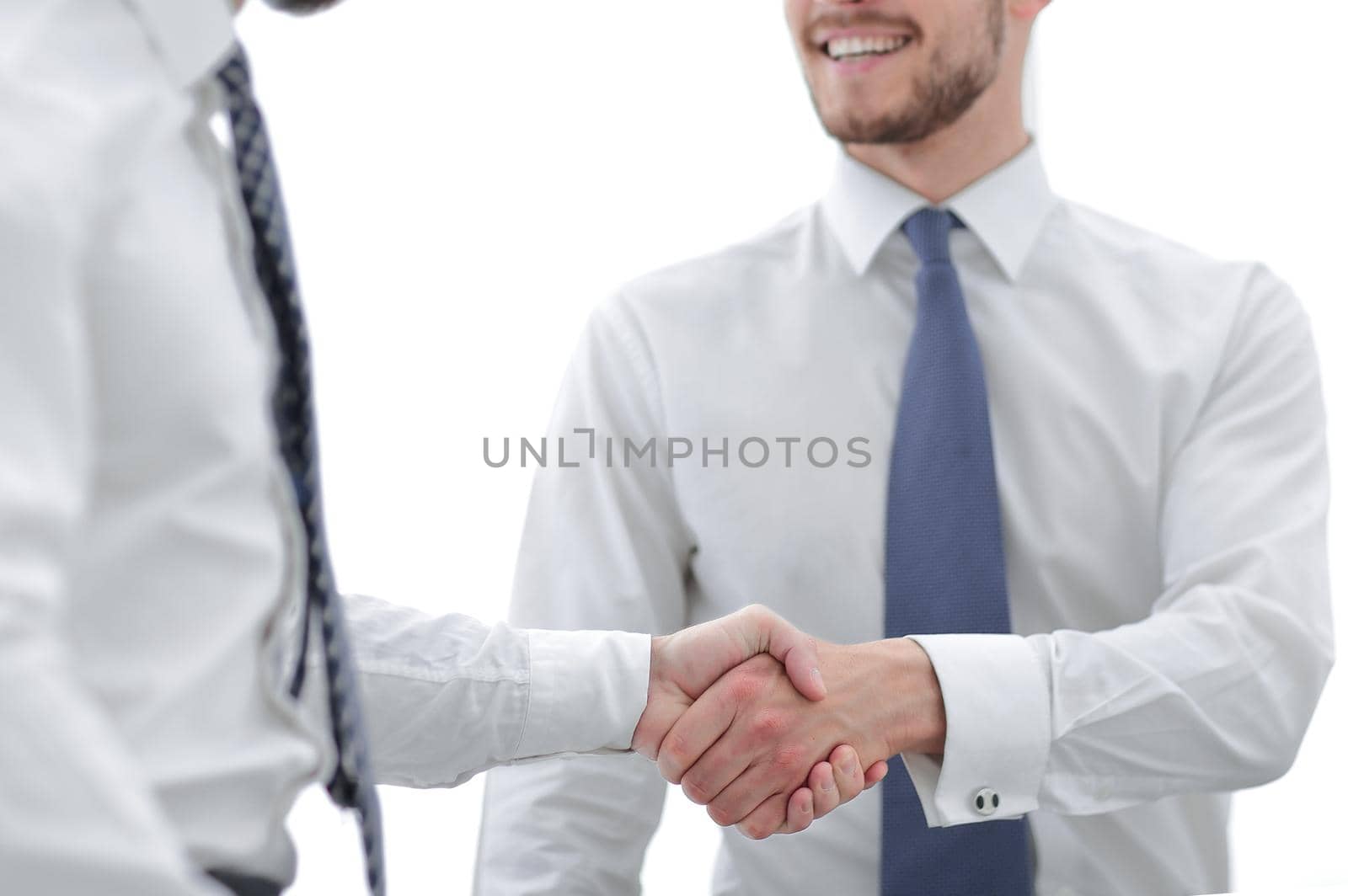 close up.business handshake of business people on a light background.concept of partnership