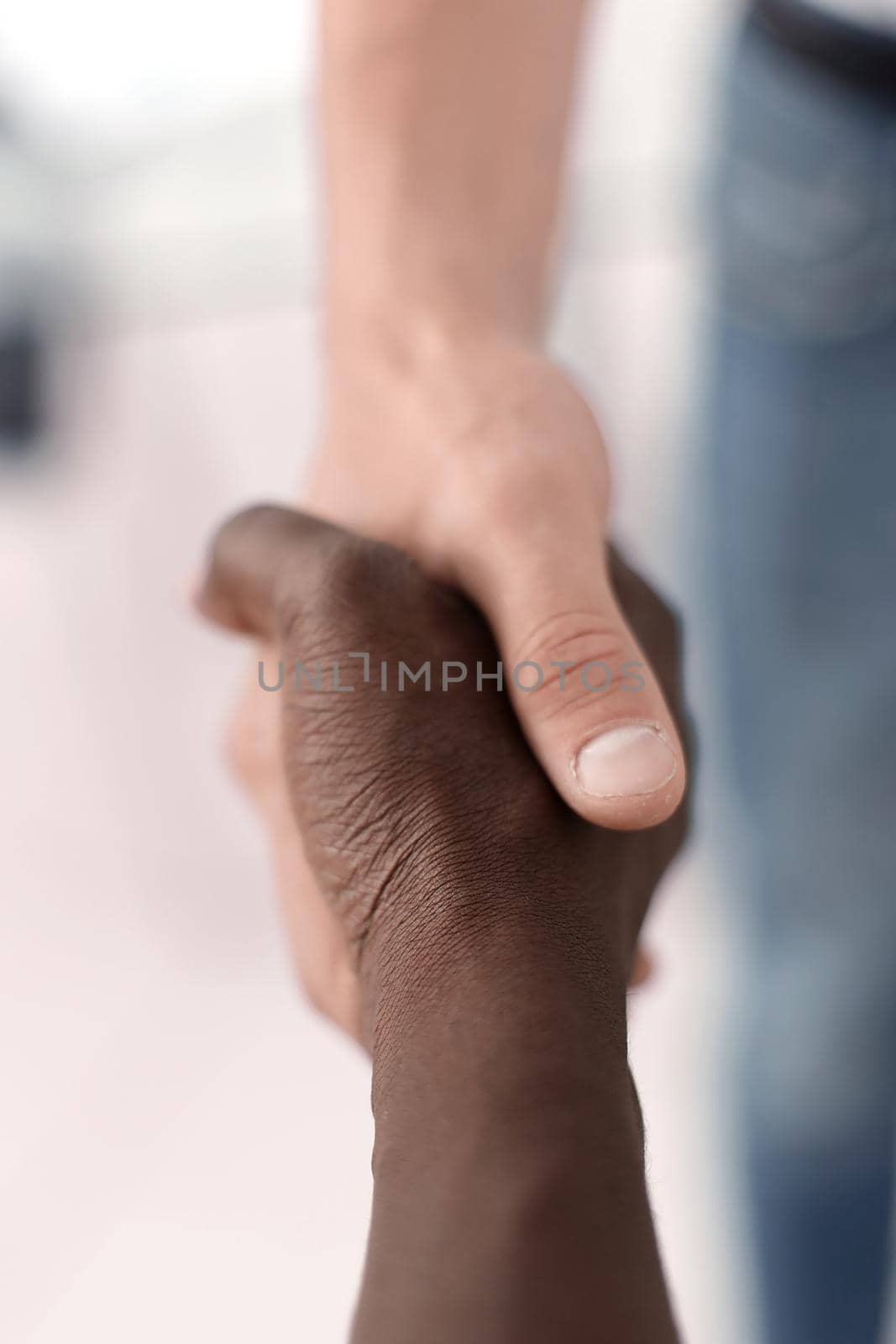 close up. handshake between two business partners .the concept of cooperation
