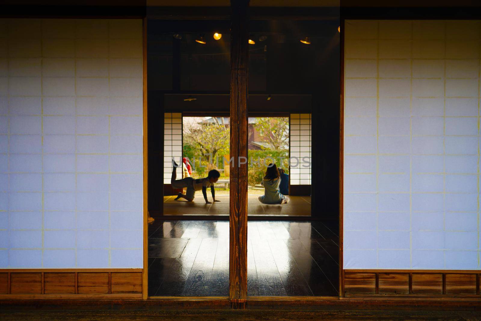 Kids playing with old people. Shooting Location: Tokyo metropolitan area