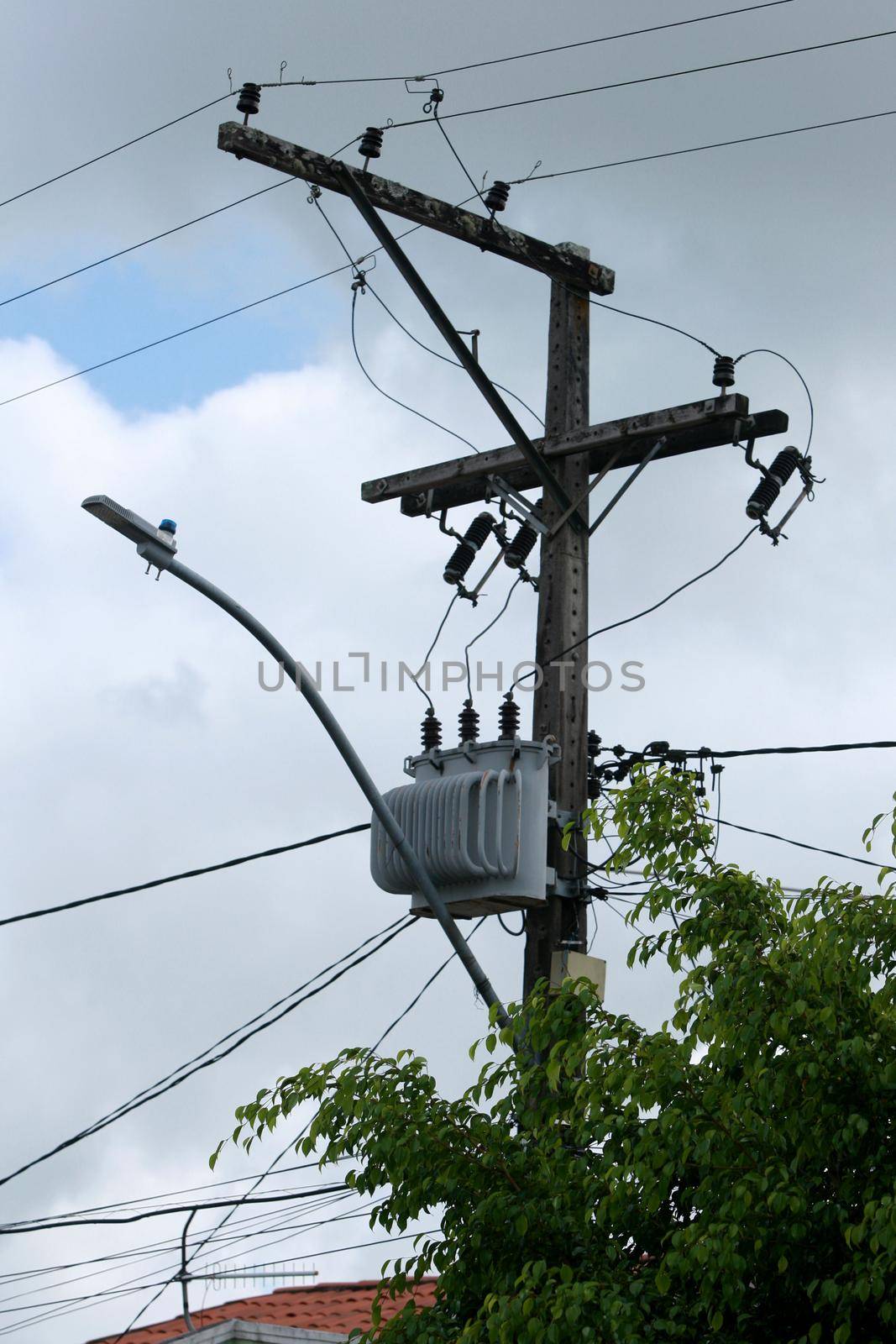 feira de santana, bahia, brazil - may 6, 2022: Electric network transformer is seen on a pole in the city of Feira de Santana.