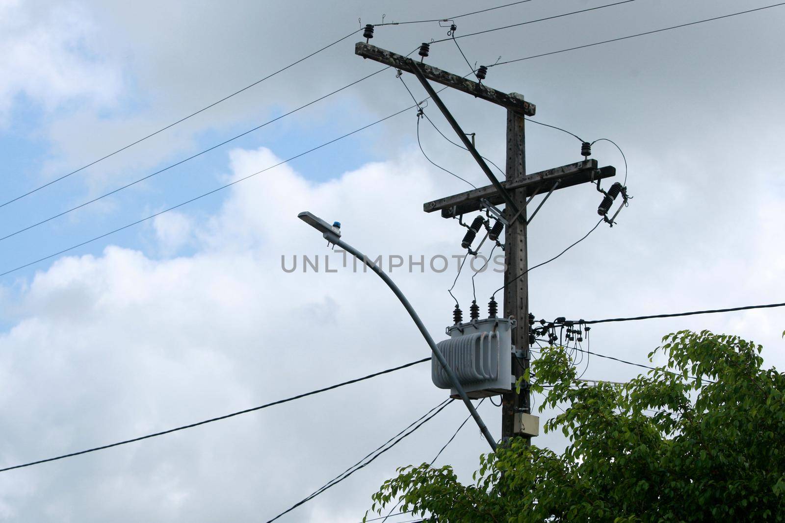 feira de santana, bahia, brazil - may 6, 2022: Electric network transformer is seen on a pole in the city of Feira de Santana.