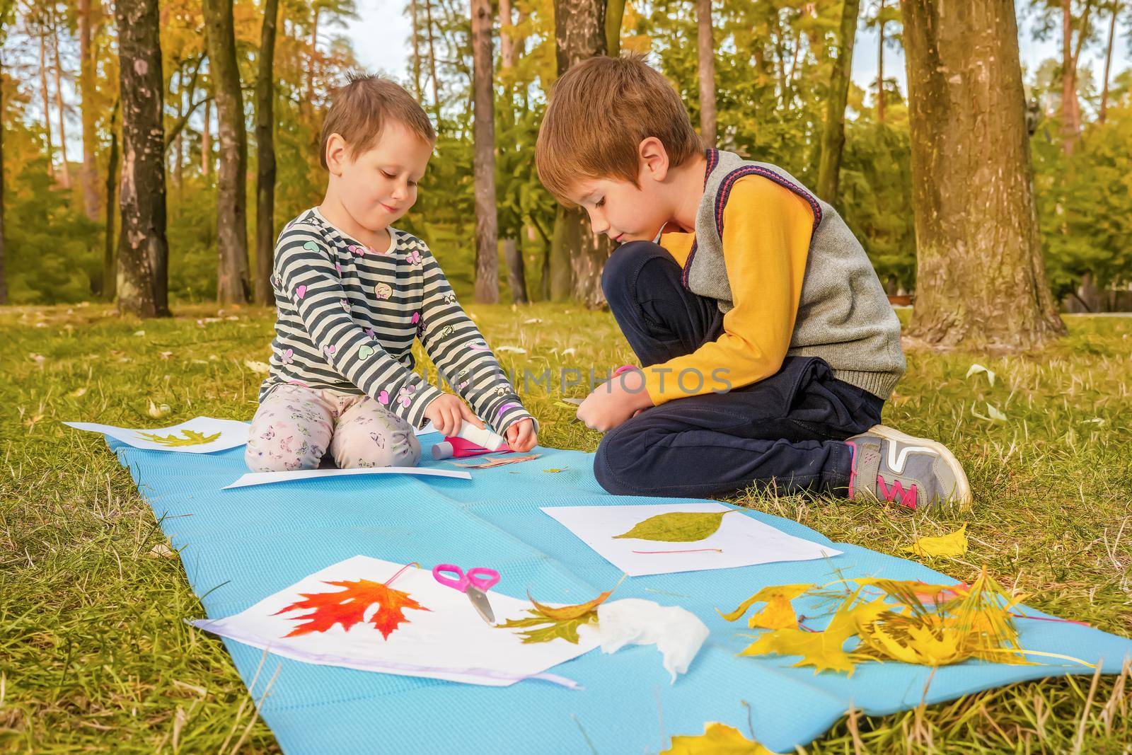 Kids workshop children glue scissors art craft kids handmade autumn child art education nature creative autumn leaves. Diy art kid creative play learning outside school outdoor learning park school