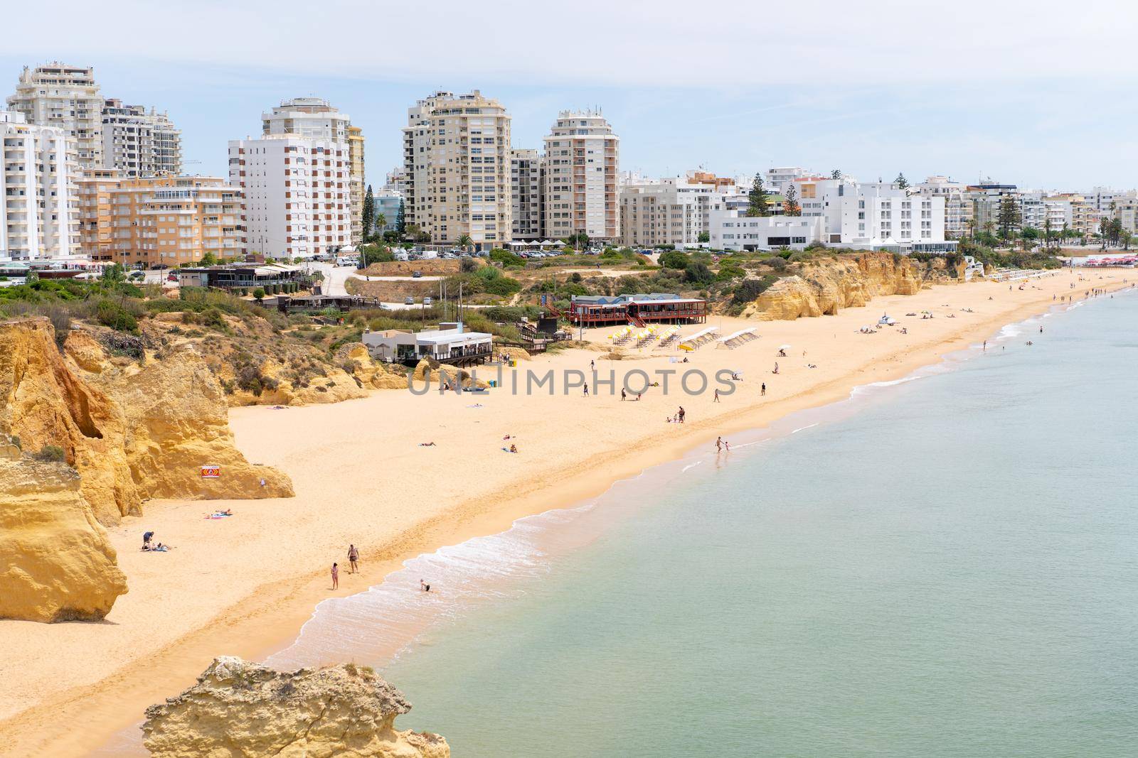 Armacao de Pera Algarve Portugal. Beautiful view on Atlantic ocean at day time and city. High quality FullHD footage