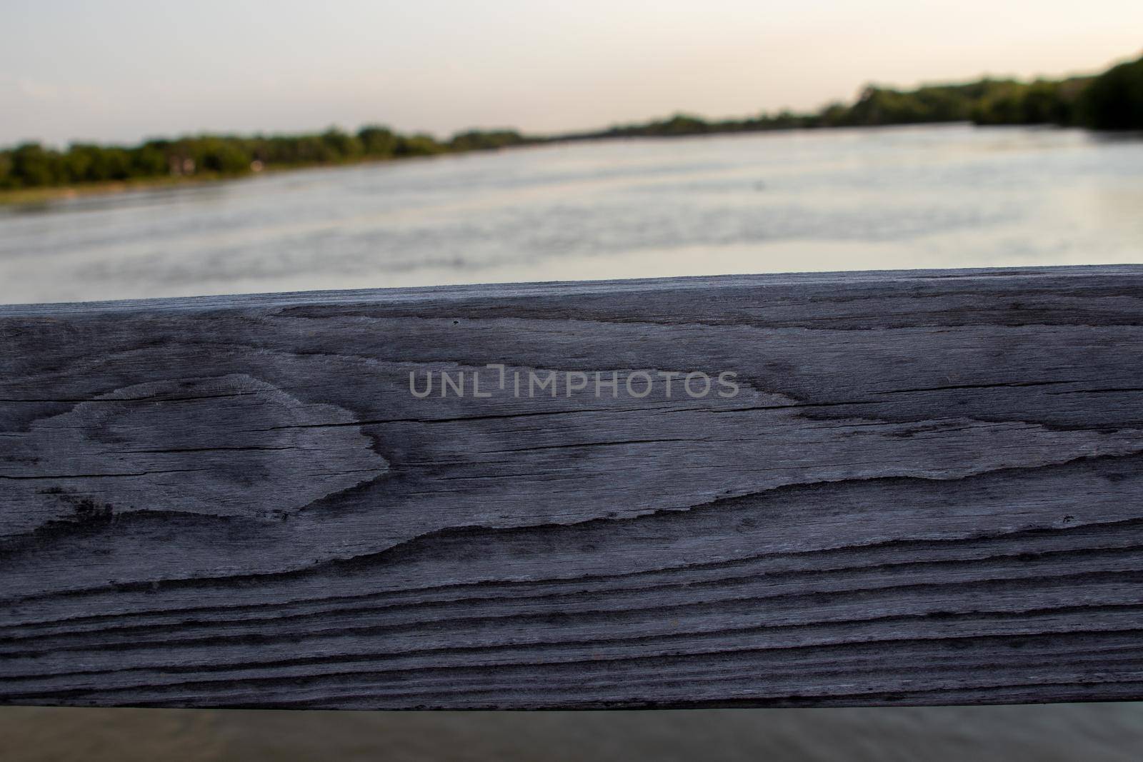 View of Platte river thru wooden Bridge rails by gena_wells