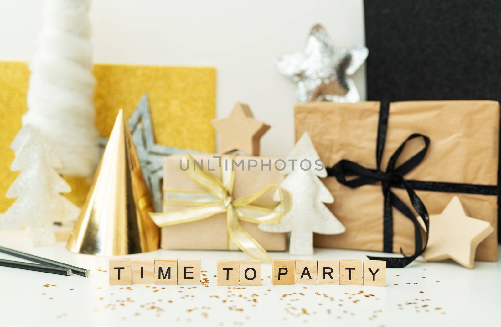Christmas party time - confetti, gifts, tree, stars, glitter, ribbon. Party time lettering New year 2022