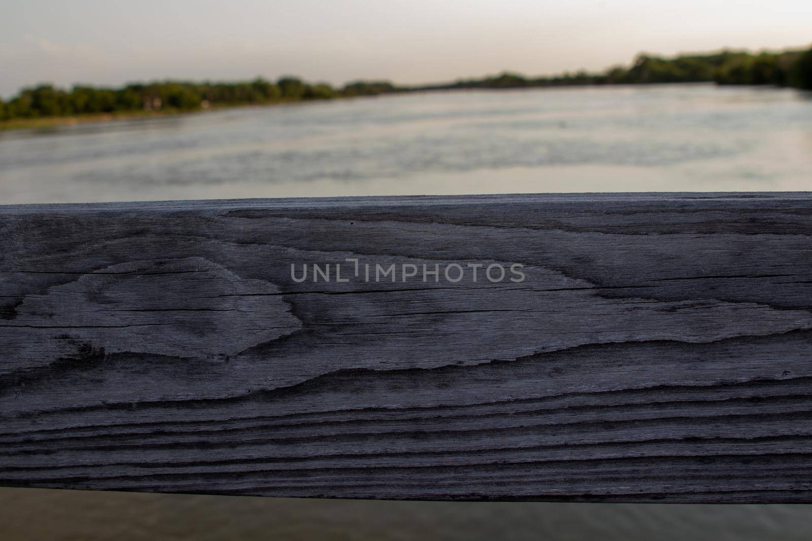 View of Platte river thru wooden Bridge rails by gena_wells