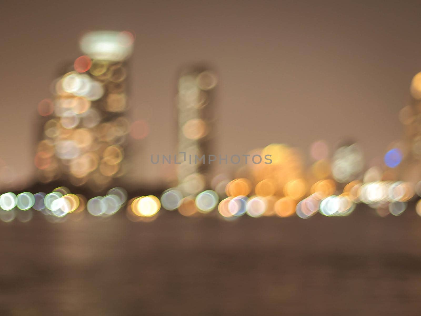 Bokeh city lights background. Bokeh of cityscape skyline during evening dark blue sunset, dusk twilight