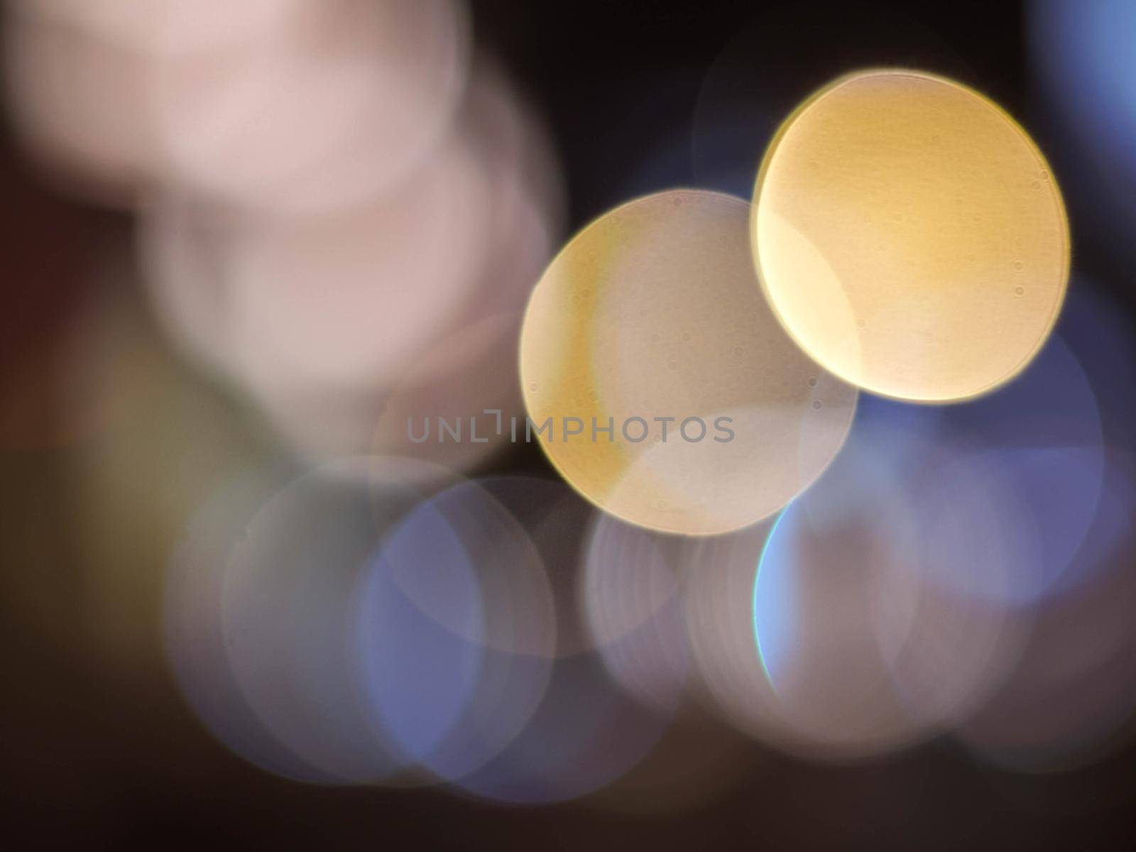Colorful blur light hexagon bokeh background. Abstract Christmas festival defocused background.