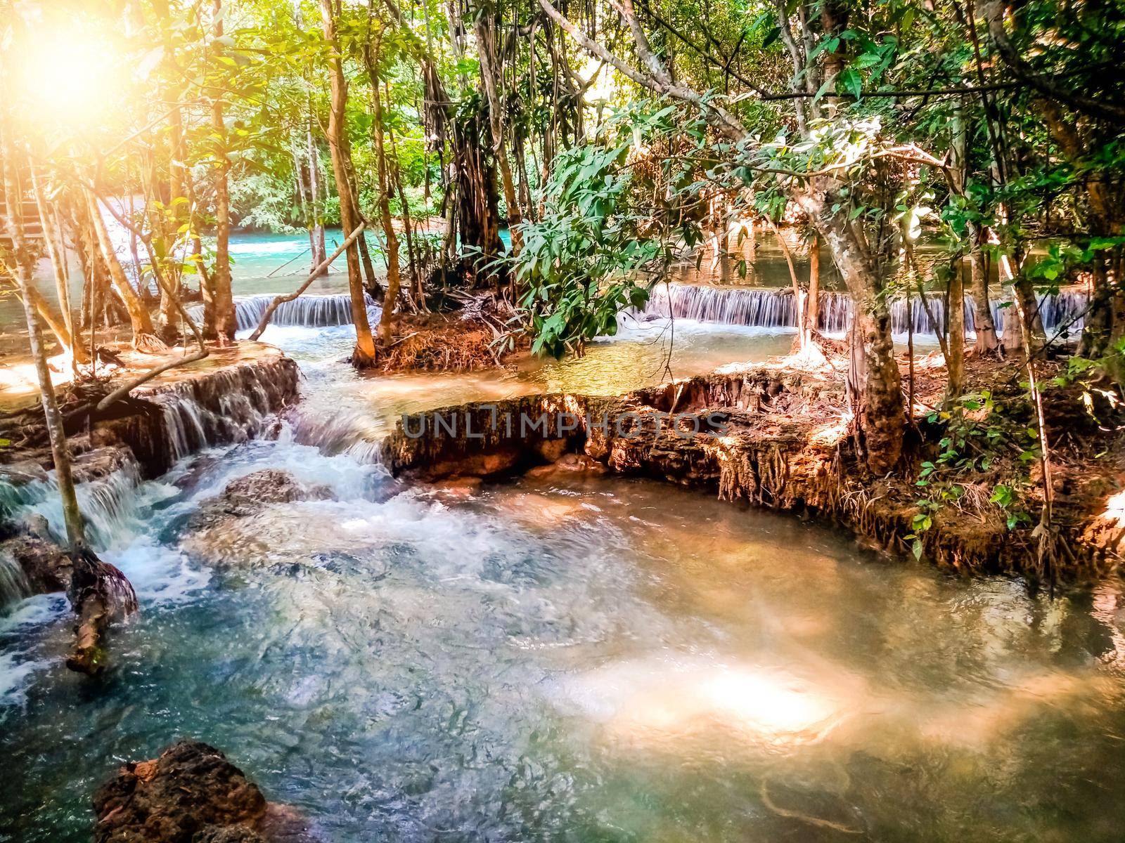 Huay Mae Khamin waterfall in Kanchanaburi, Thailand South east asia Jungle landscape with amazing turquoise water of cascade waterfall at deep tropical rain forest. travel landscape and destinations