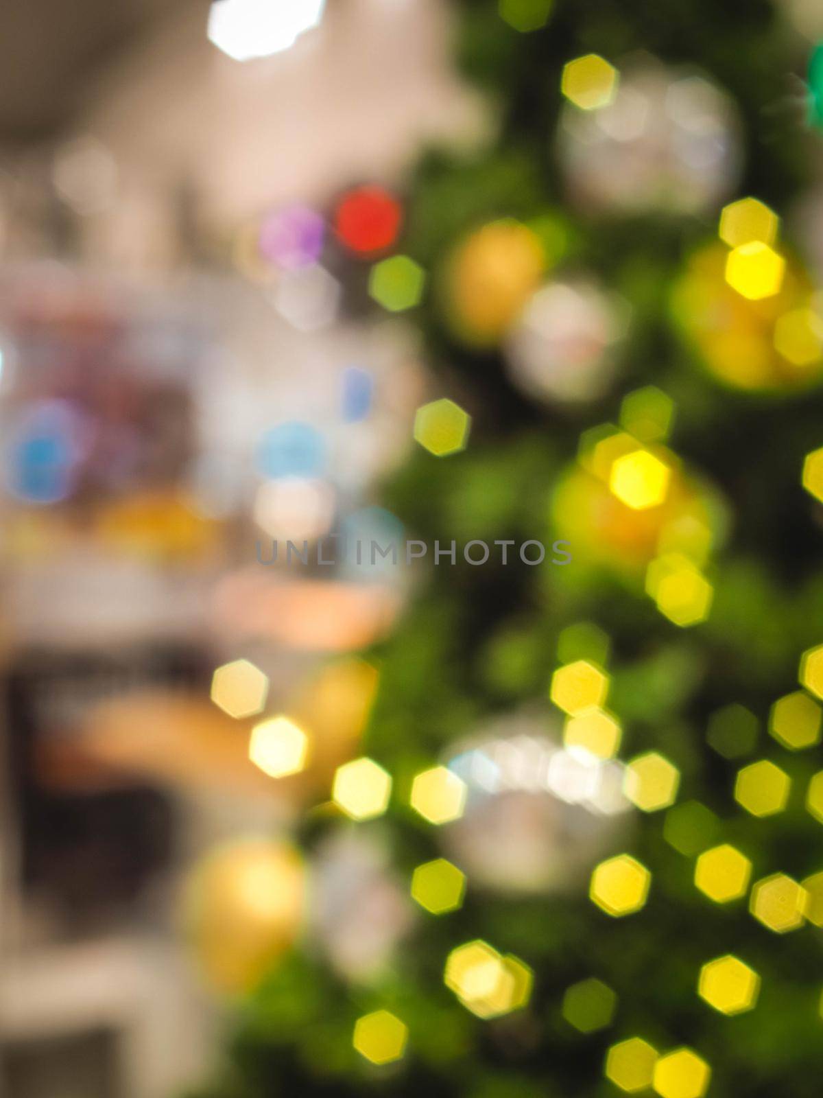 Colorful blur light hexagon bokeh background. Abstract Christmas festival defocused background. by Petrichor