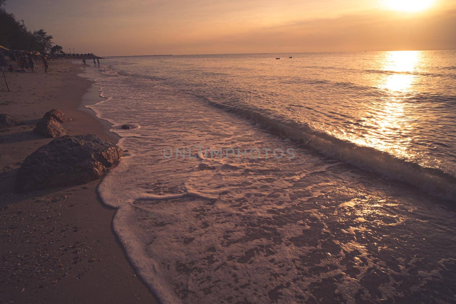 Soft Blue Waves on the beach at the summer time. sea beach blue sky sand sun daylight relaxation landscape viewpoint. The color of the water and beautifully bright clear water.
