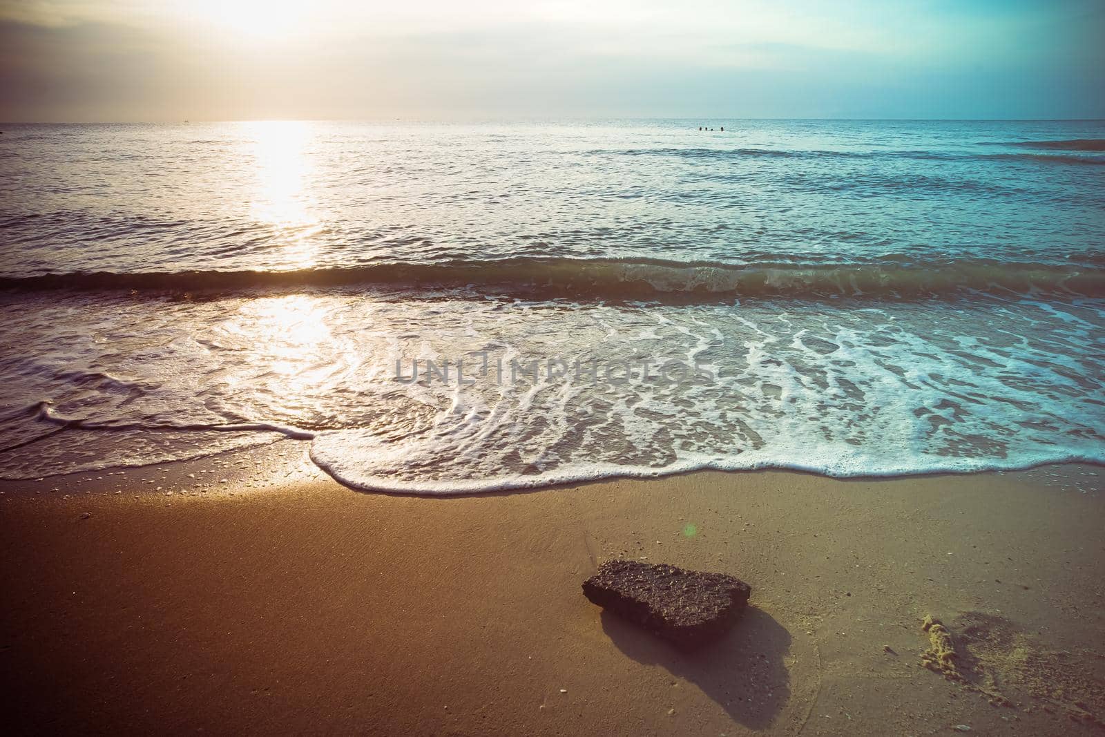 Soft Blue Waves on the beach at the summer time. sea beach blue sky sand sun daylight relaxation landscape viewpoint. The color of the water and beautifully bright clear water.