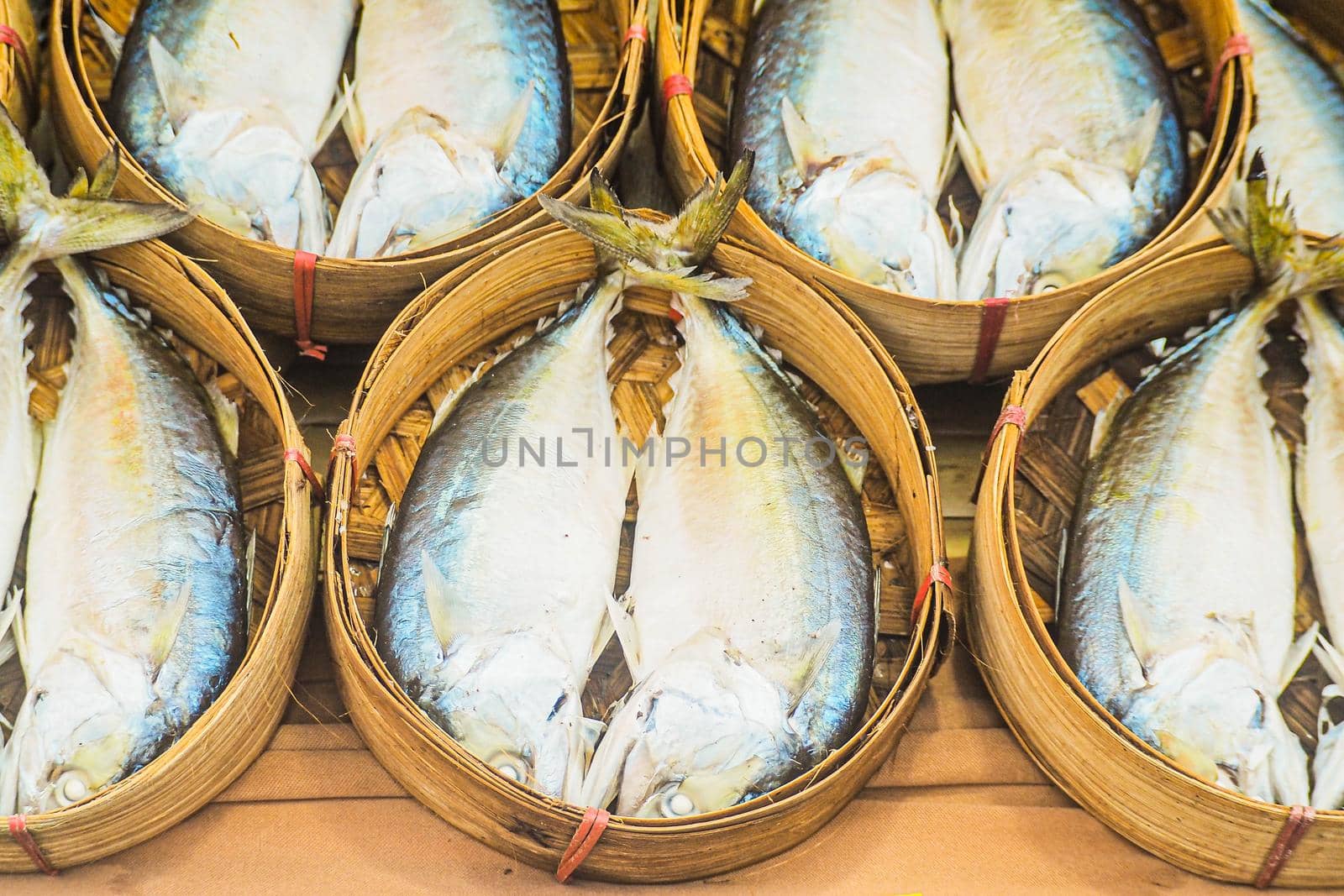 Mackerel Fishes in the Basket market business fishing industry for food.