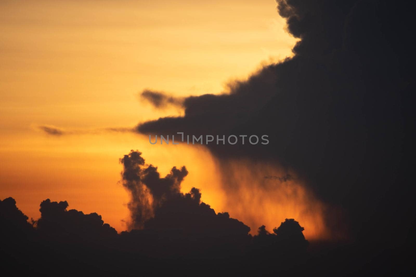Giant dark cloud. Storm Clouds at Sunset before rain abstract weather environment season.