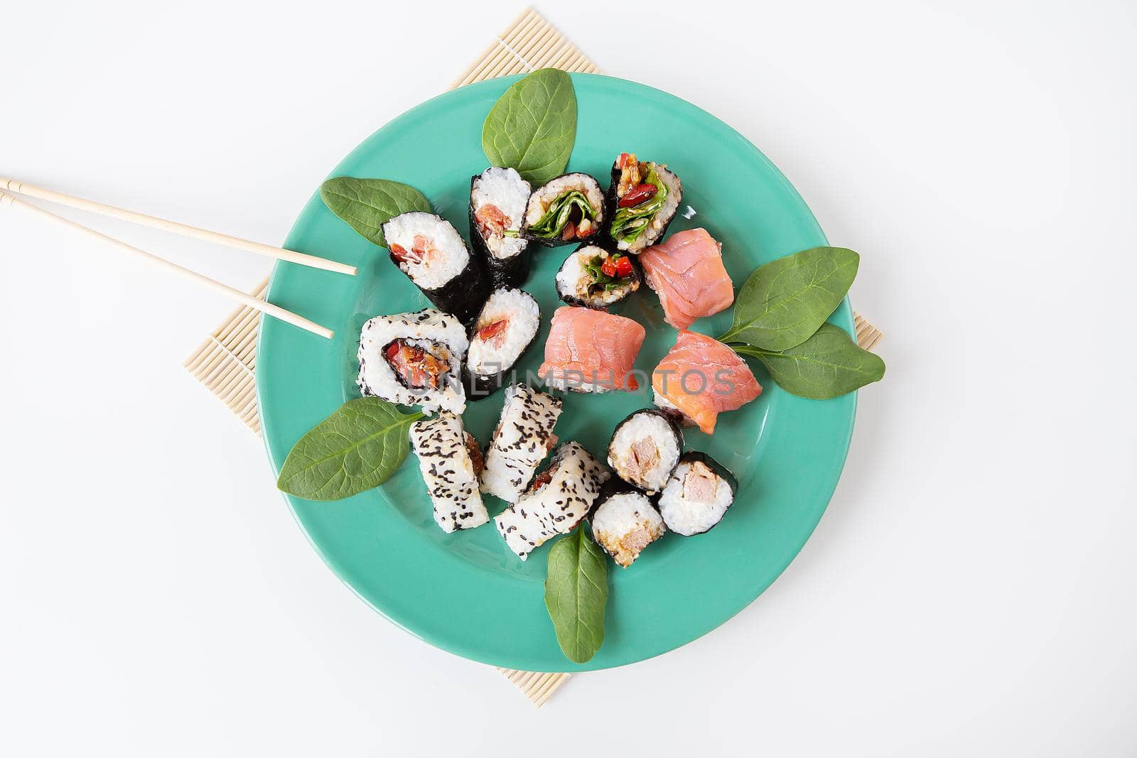 Various types of maki sushi, philadelphia, maki, salmon, rice, salad. Delicious and healthy food. by sfinks