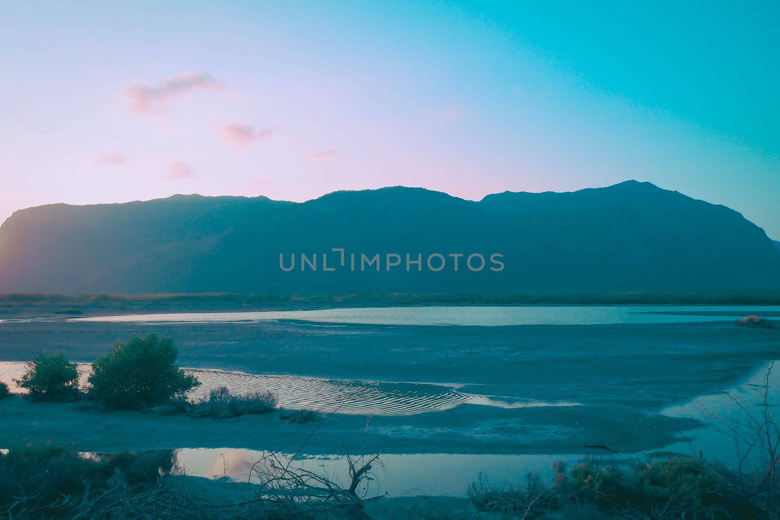 Panorama Sam Roi Yot mountain ranges layer landscape at sunset Thailand.